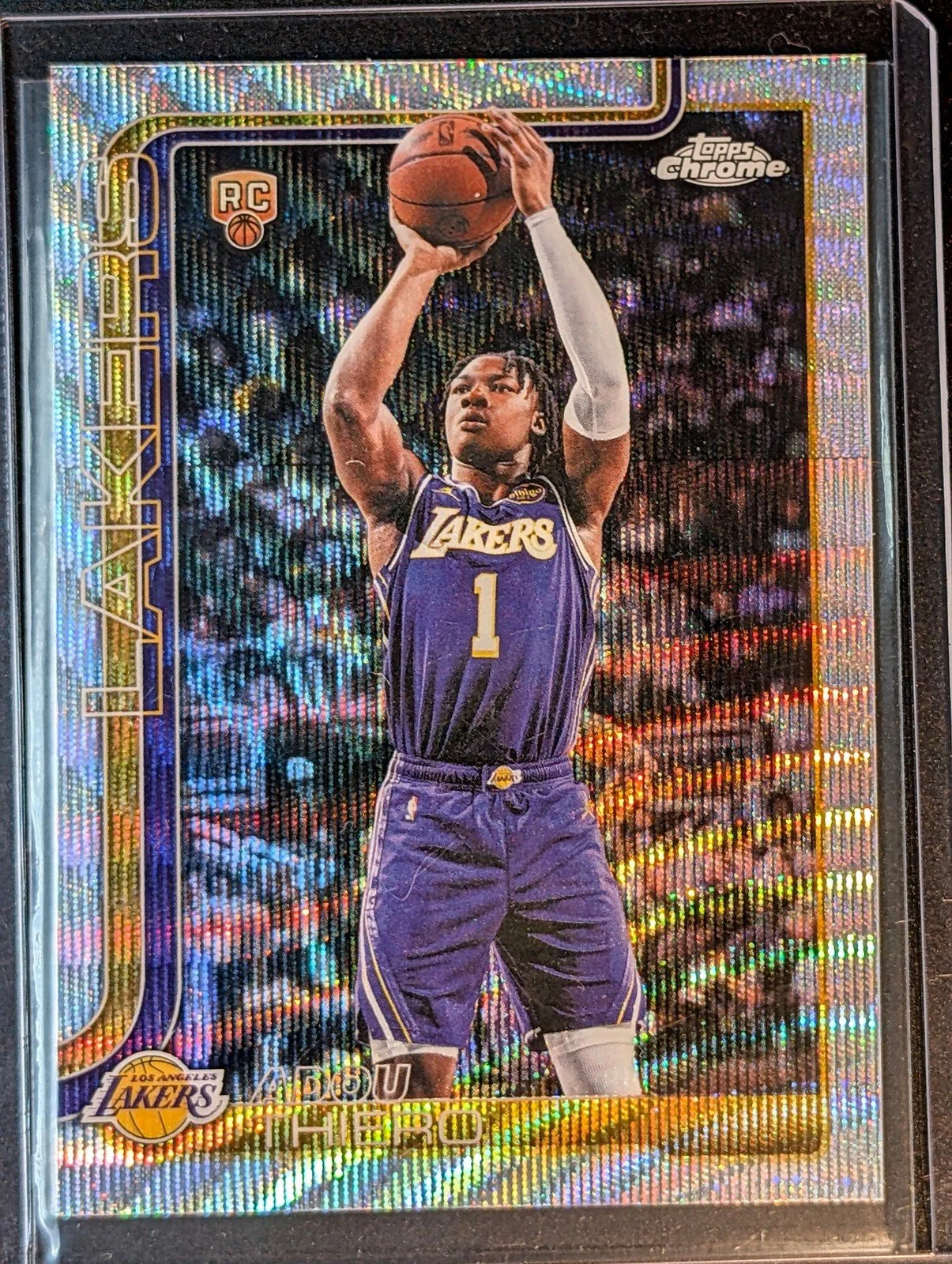Front of 2025-26 Topps Chrome Update #186 Adou Thiero Hyper Refractor
