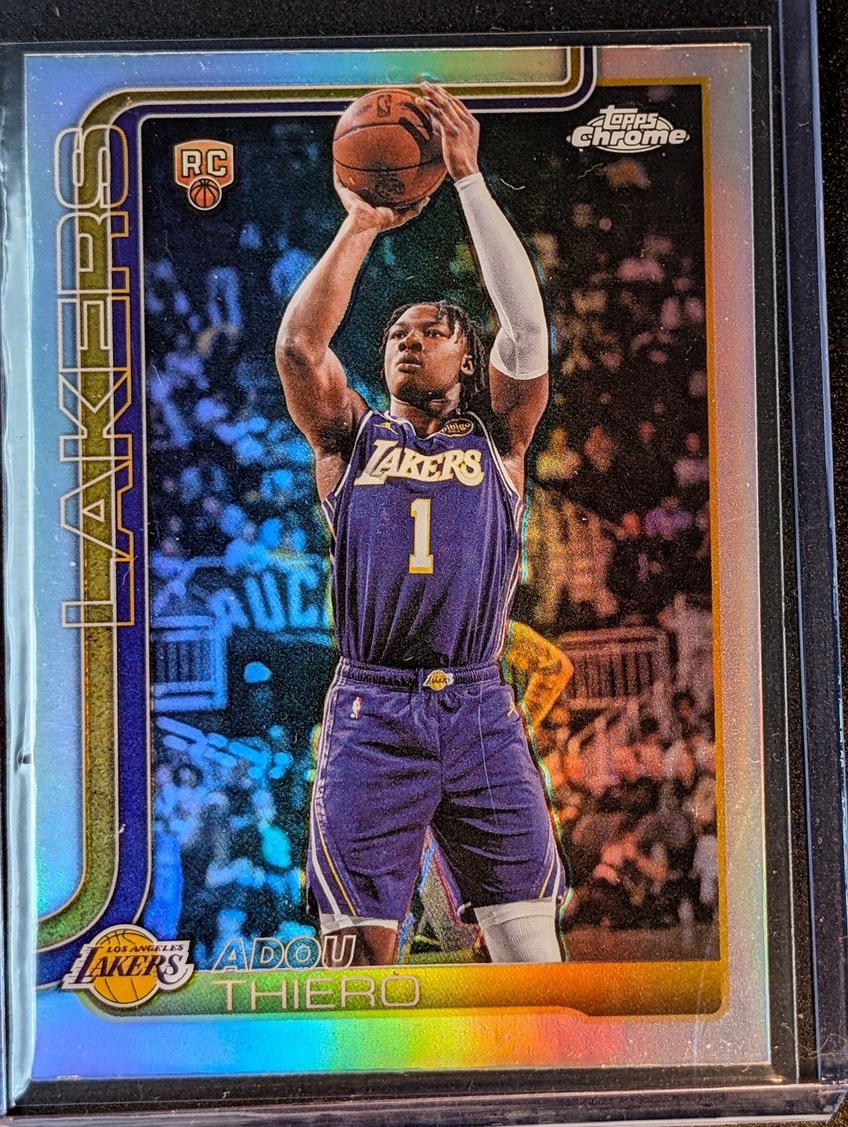 Front of 2025-26 Topps Chrome Update #186 Adou Thiero Refractor