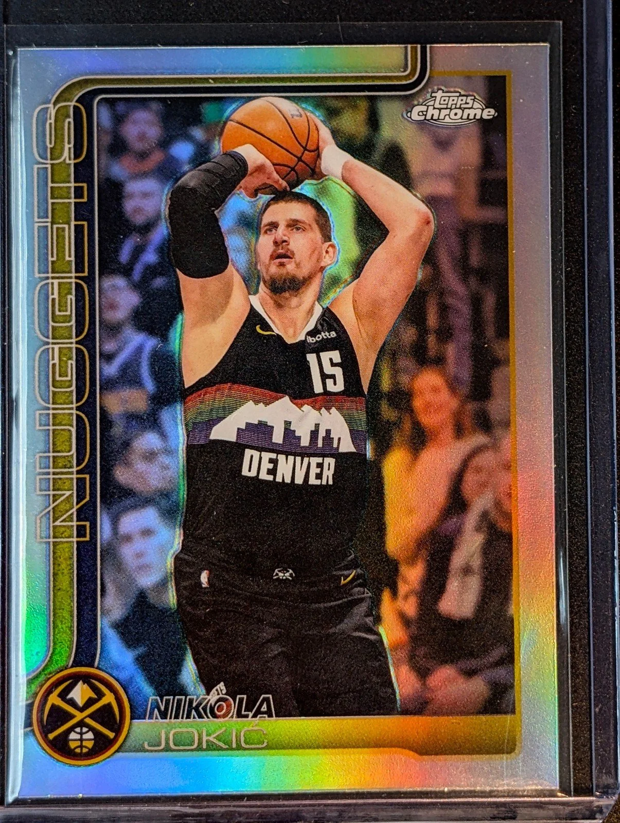 Front of 2025-26 Topps Chrome Update #12 Nikola Jokić Refractor