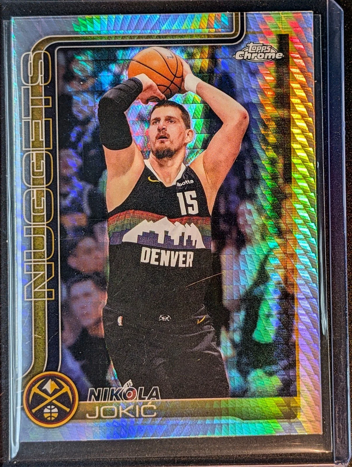 Front of 2025-26 Topps Chrome Update #12 Nikola Jokić Prism Refractor