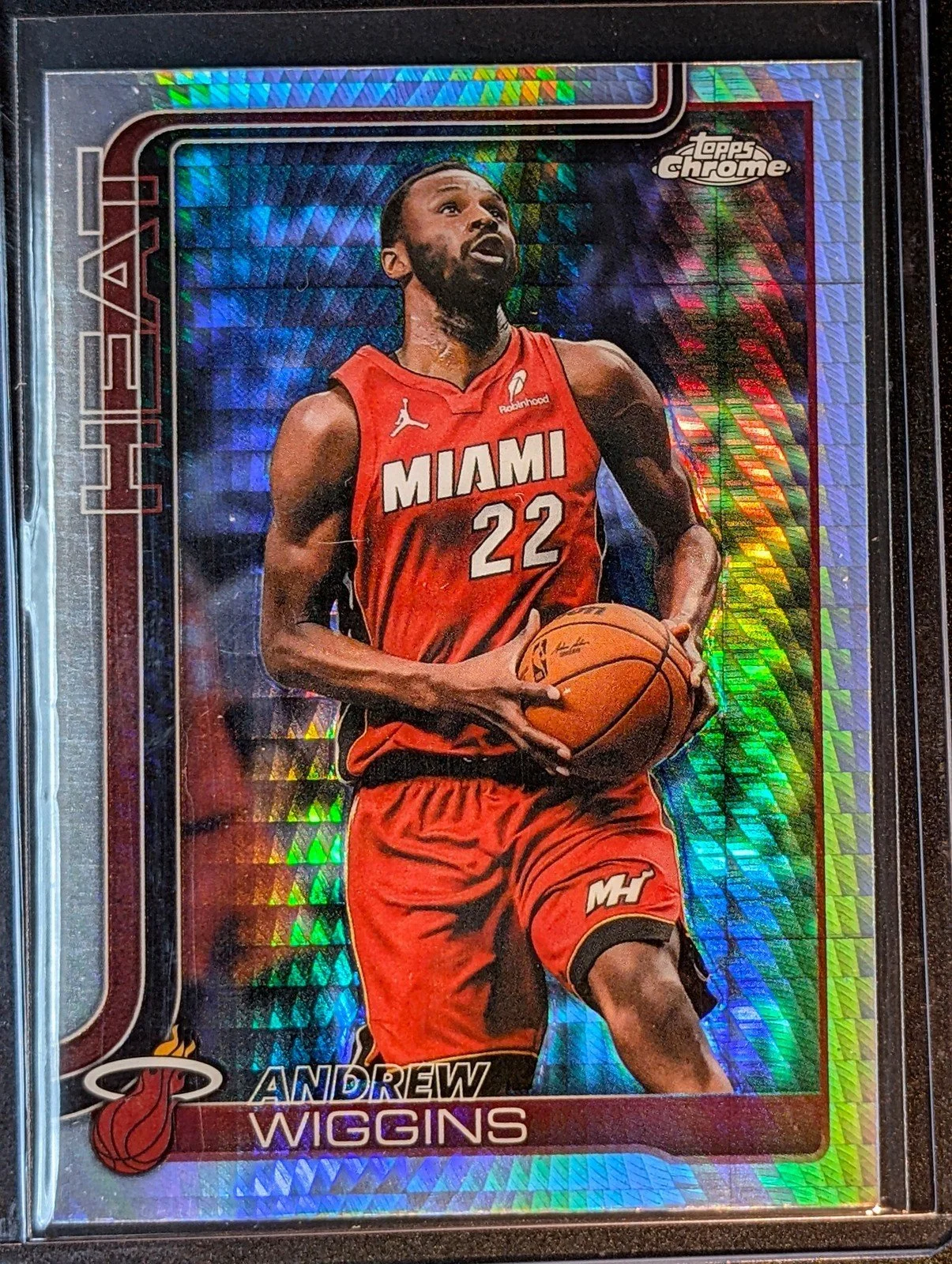 Front of 2025-26 Topps Chrome Update #128 Andrew Wiggins Refractor