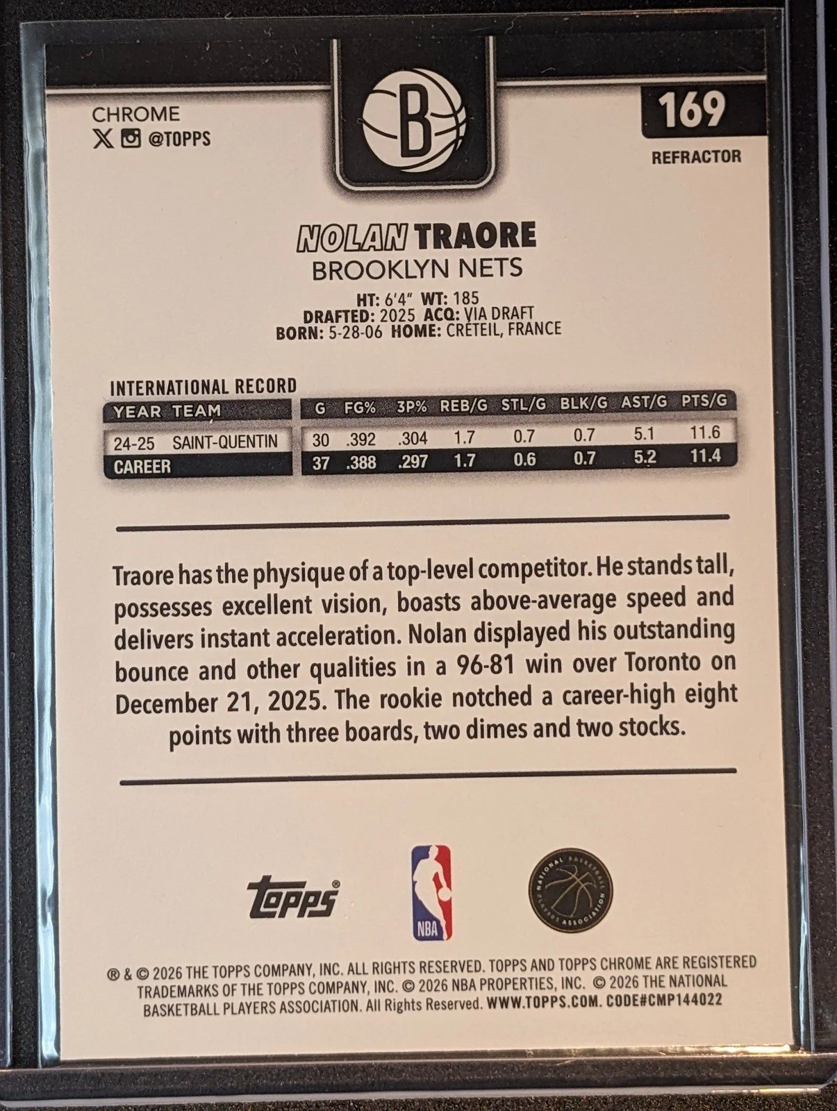 Back of 2025-26 Topps Chrome Update #169 Nolan Traore Refractor Rookie