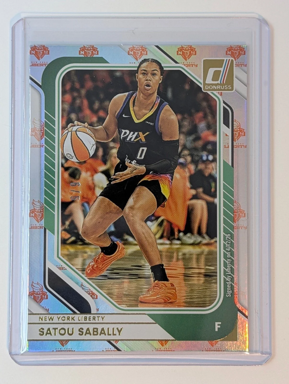 Front of BOOKEND 9/9 SSP FOTL 2026 Panini Donruss WNBA Satou Sabally Holo Team Logo /9
