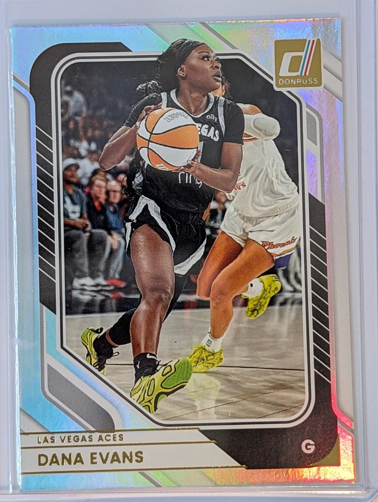 Front of 2026 Panini Donruss WNBA #83 Dana Evans Holo