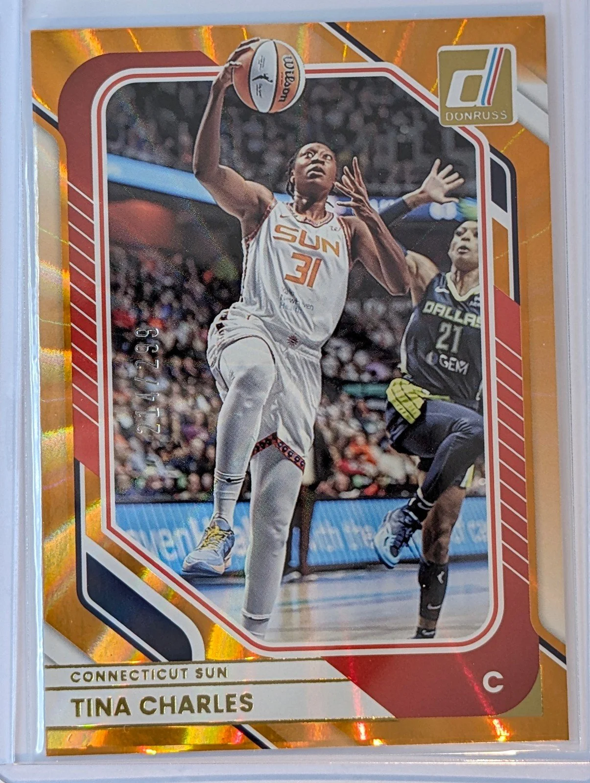 Front of 2026 Panini Donruss WNBA /299 Orange Laser Tina Charles #71