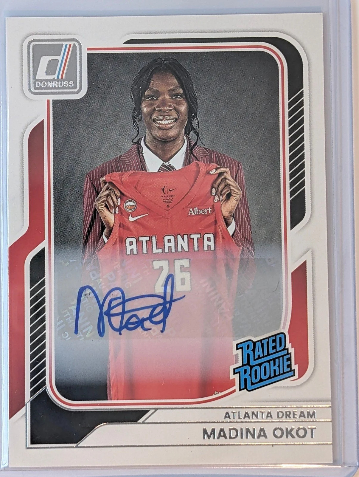 Front of 2026 Panini Donruss WNBA #97 Madina Okot Rated Rookies Signatures