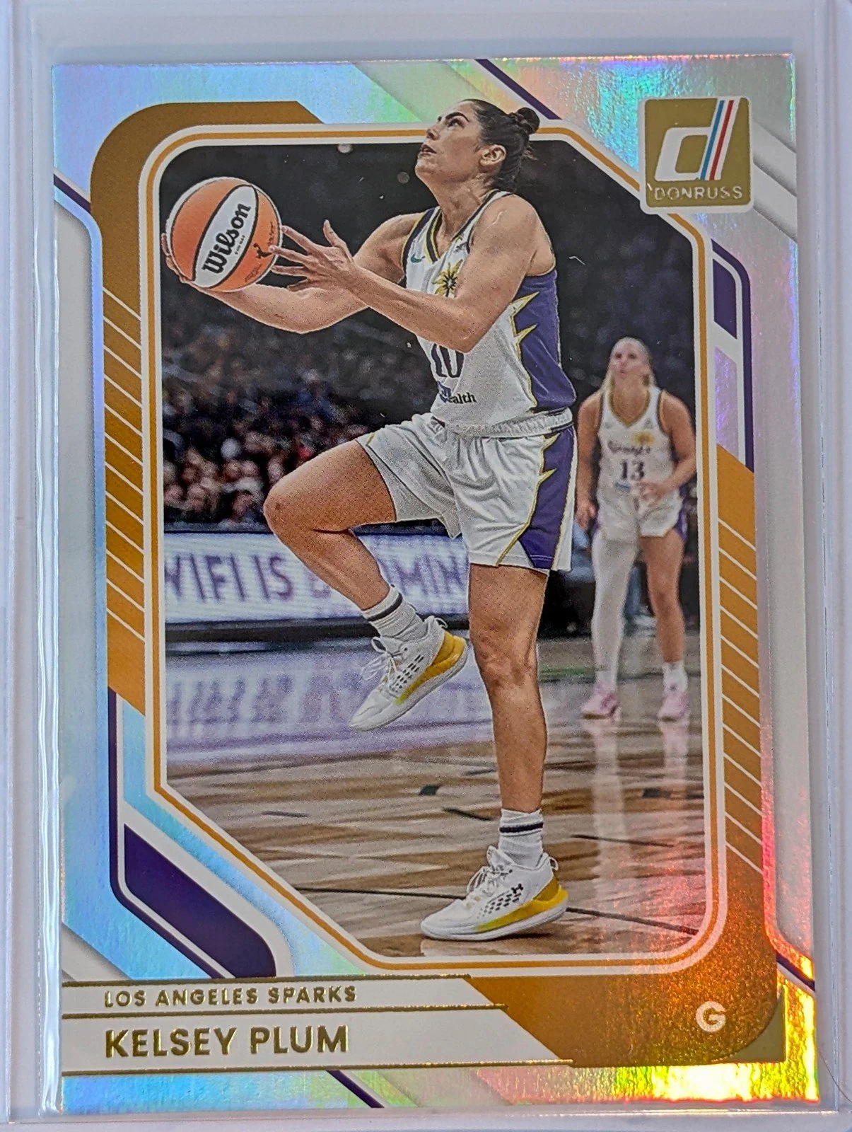 Front of 2026 Panini Donruss WNBA #48 Kelsey Plum Holo