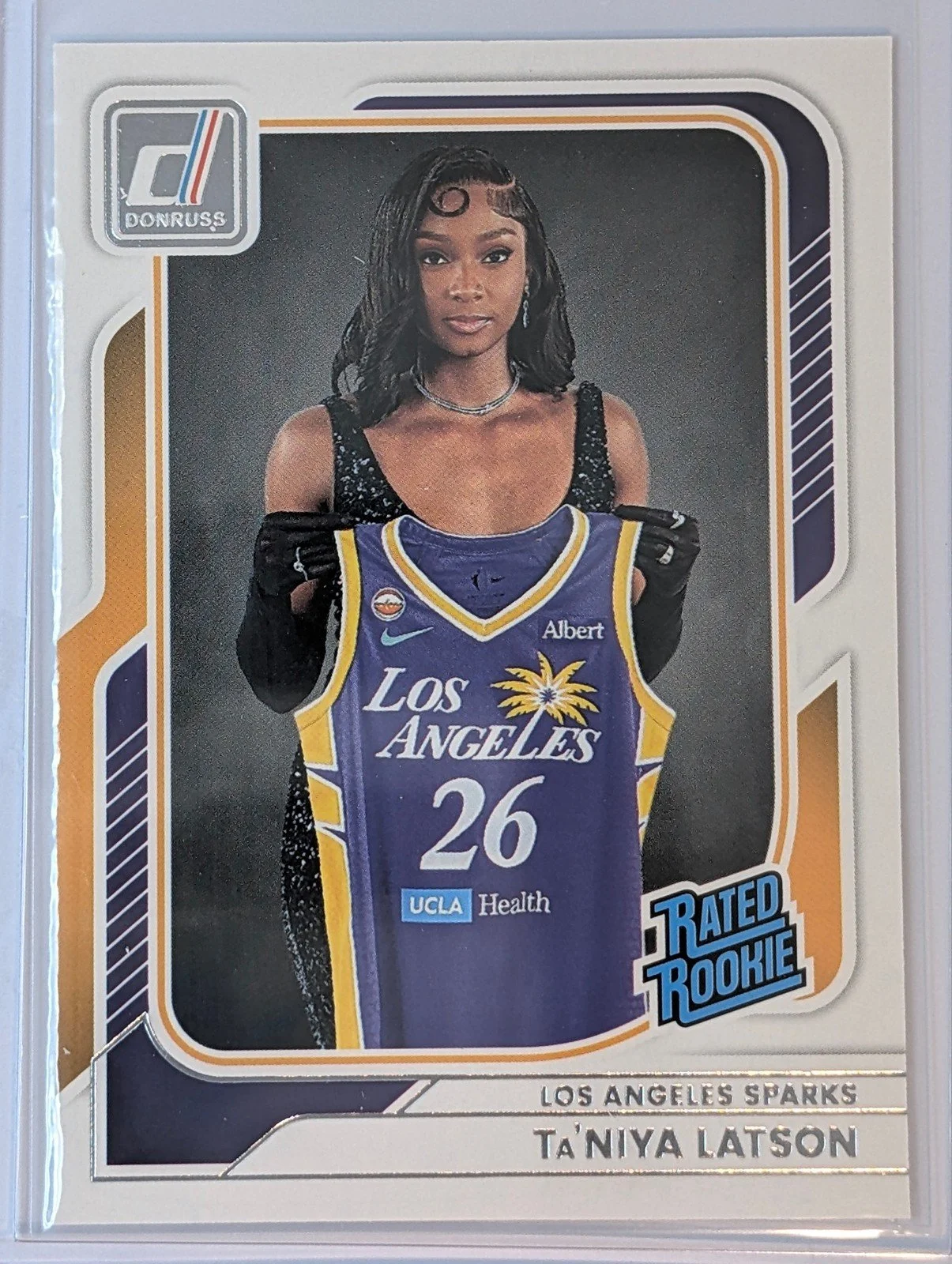 Front of 2026 Panini Donruss WNBA #100 Ta'Niya Latson Rated Rookie