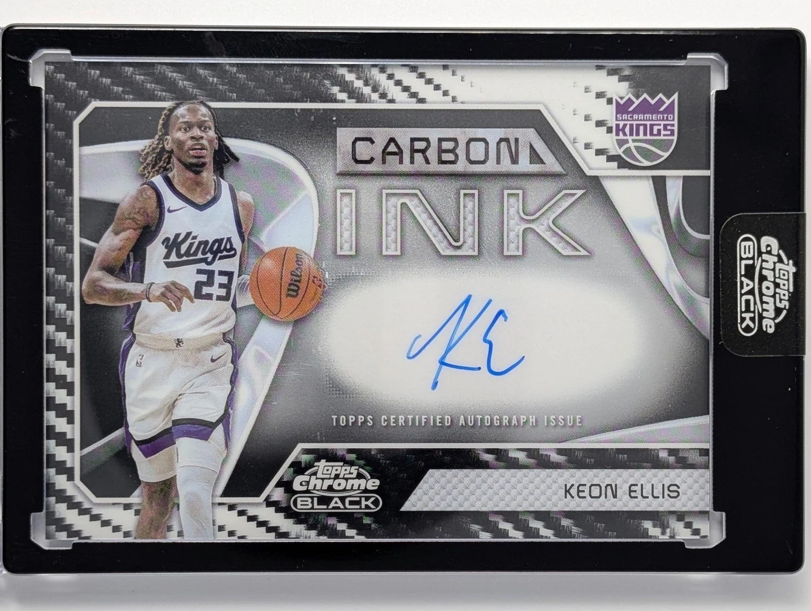 Front of 2025-26 Topps Chrome Black #CI-KE Keon Ellis Carbon Ink Autographs