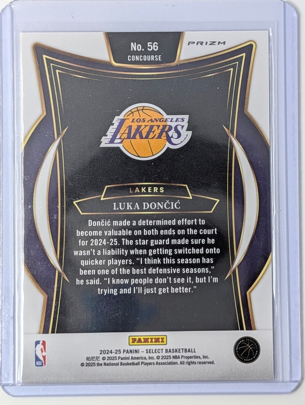 Back of 2024-25 Panini Select #56 Luka Doncic Orange Tectonic Prizm