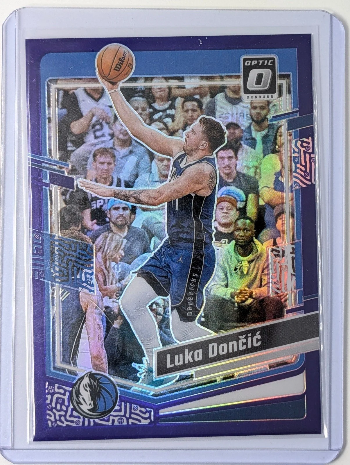 Front of 2023-24 Donruss Optic #67 Luka Doncic Purple Prizm