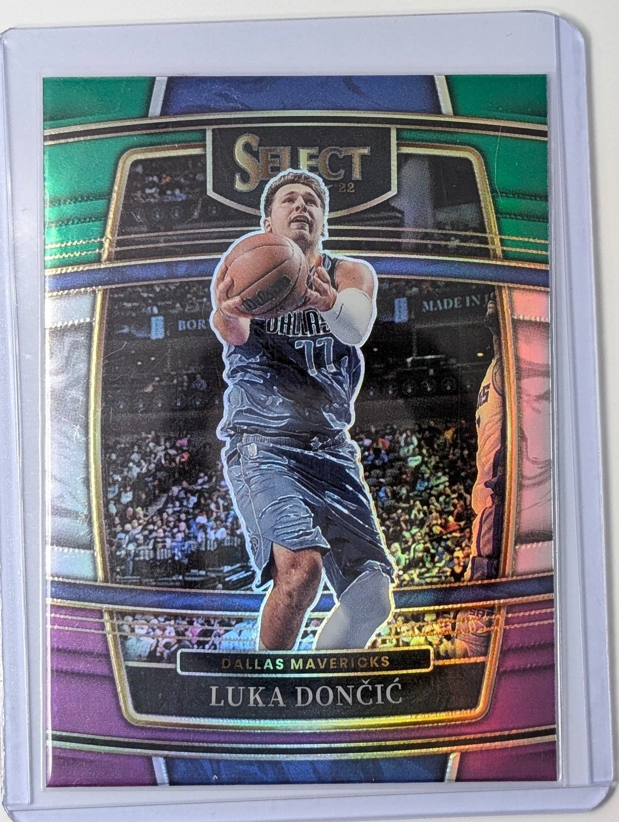 Front of 2021-22 Panini Select #12 Luka Doncic Green White Purple Prizm