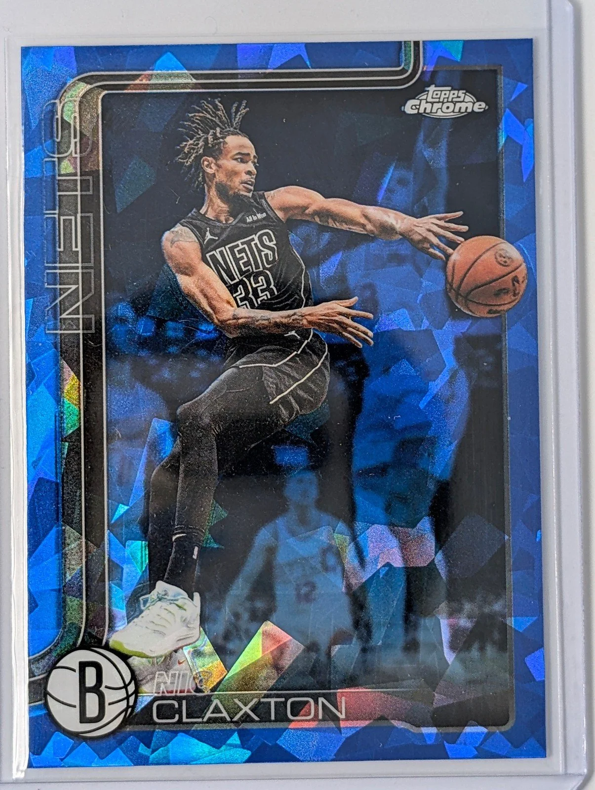 Front of 2025-26 Topps Chrome Update #123 Nic Claxton Sapphire