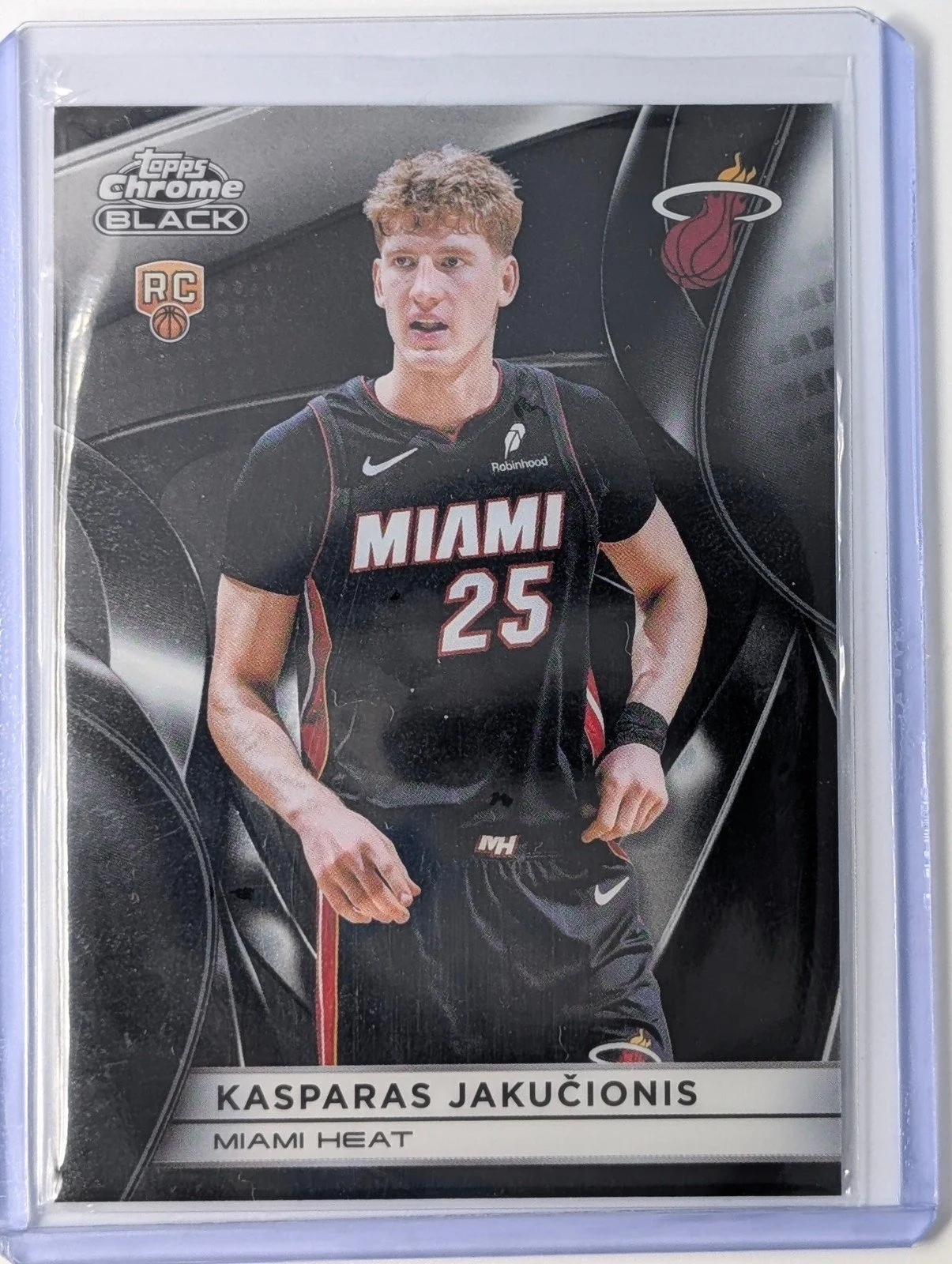 Front of 2025-26 Topps Chrome Black #120 Kasparas Jakučionis RC