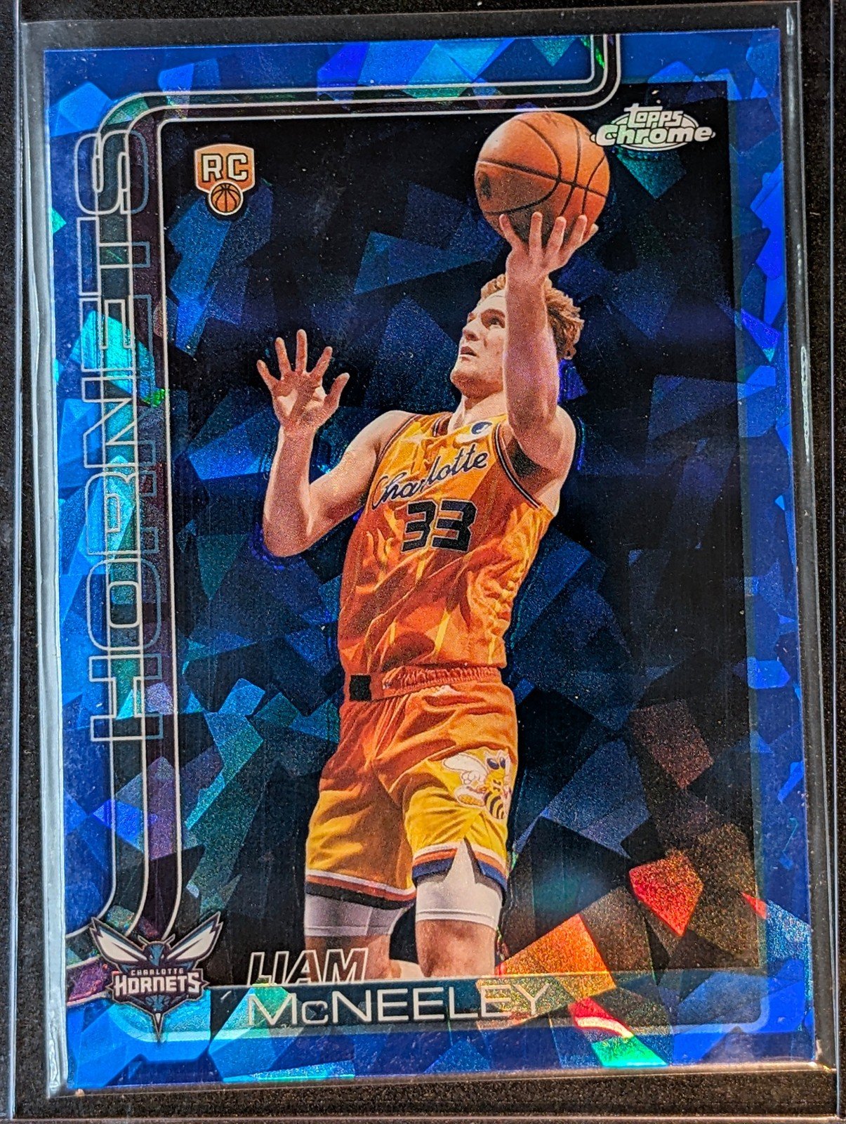 Front of 2025-26 Topps Chrome Update Liam McNeeley Sapphire #179 RC