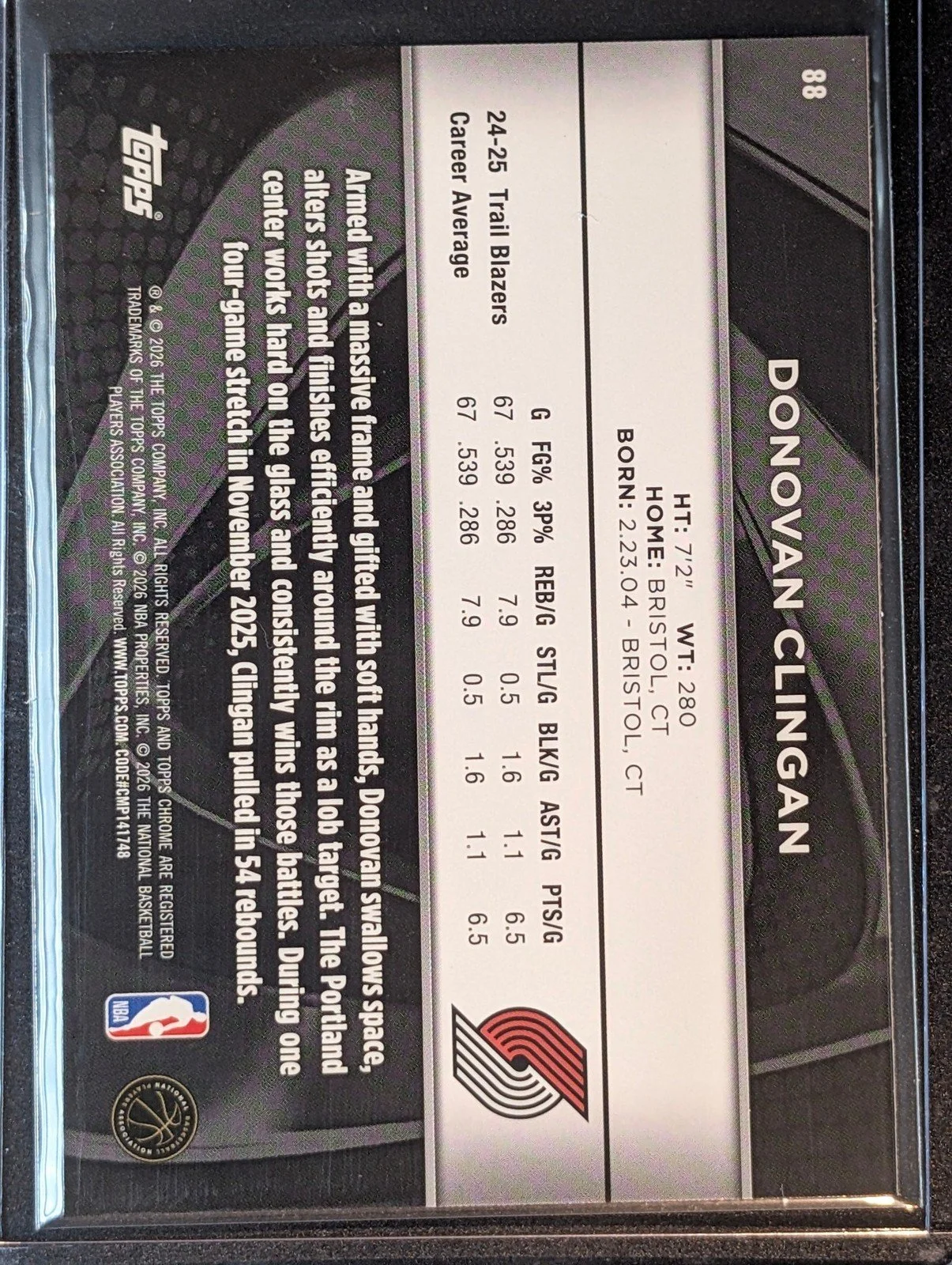 Back of 2025-26 Topps Chrome Black Donovan Clingan #88