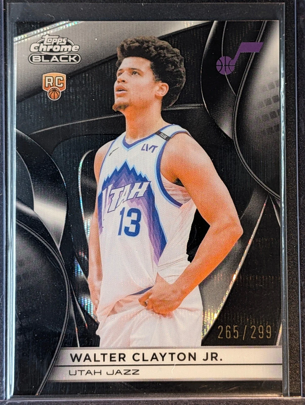 Front of 2025-26 Topps Chrome Black /299 Walter Clayton Jr. Refractor #118 RC