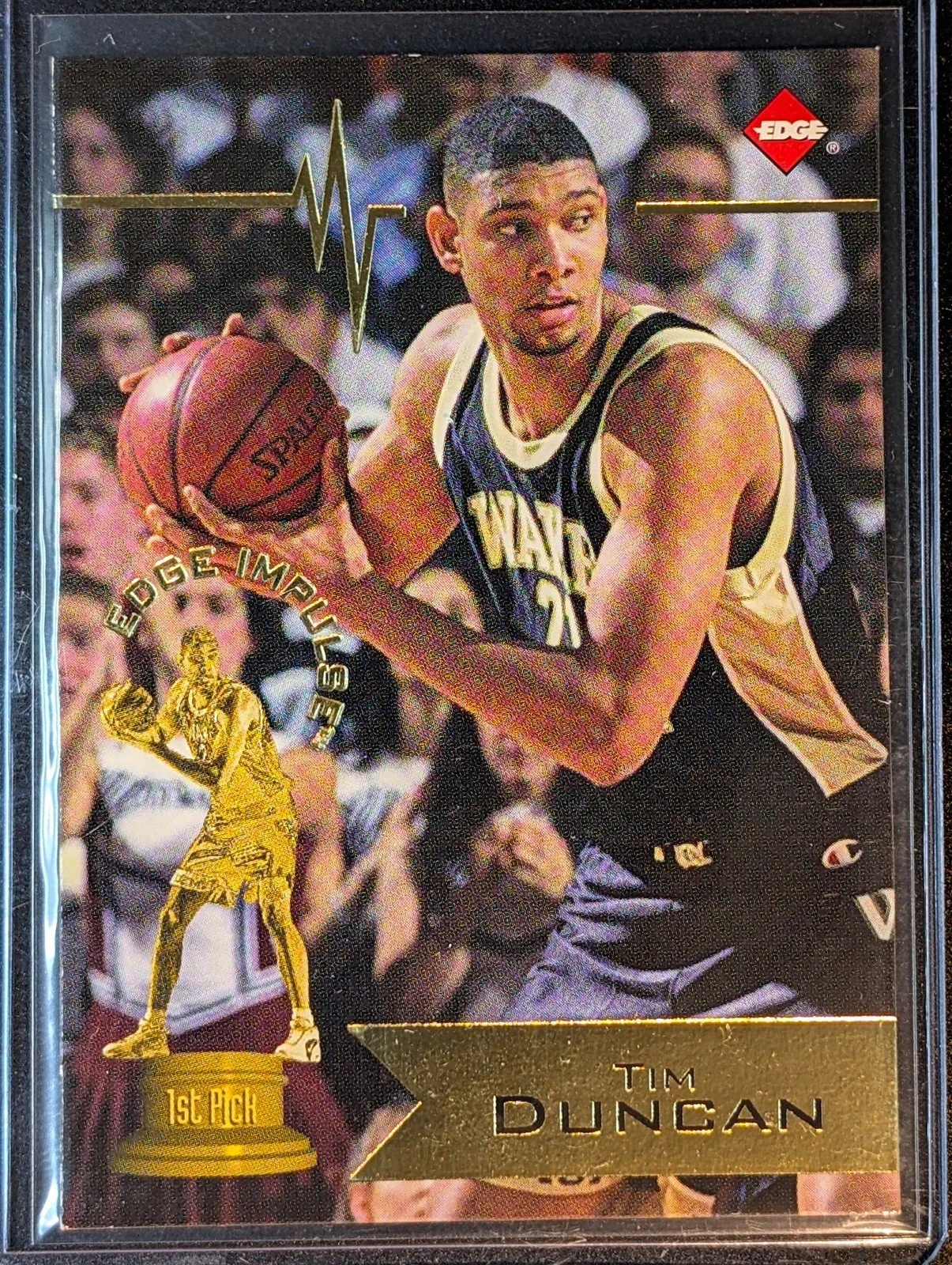 Front of 1997 Collector's Edge Impulse Tim Duncan Gold #1 RC