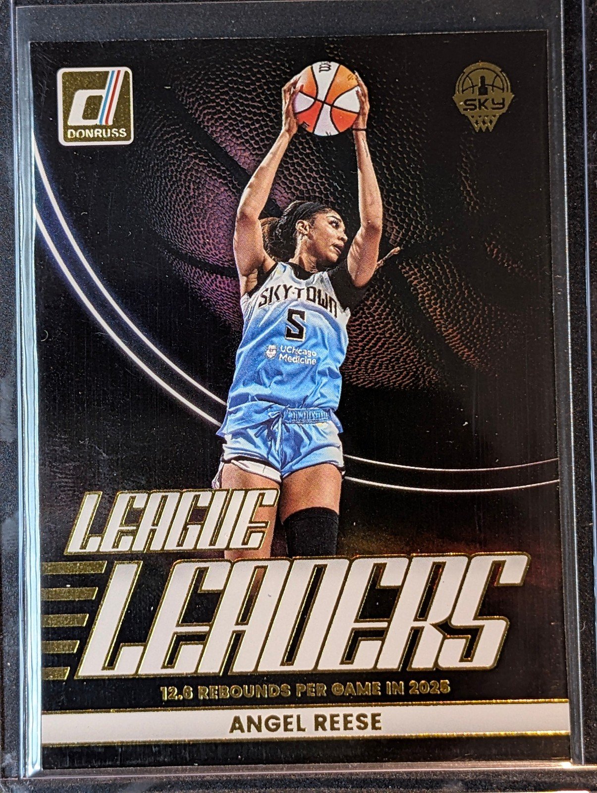 Front of 2026 Panini Donruss WNBA #5 Angel Reese League Leaders