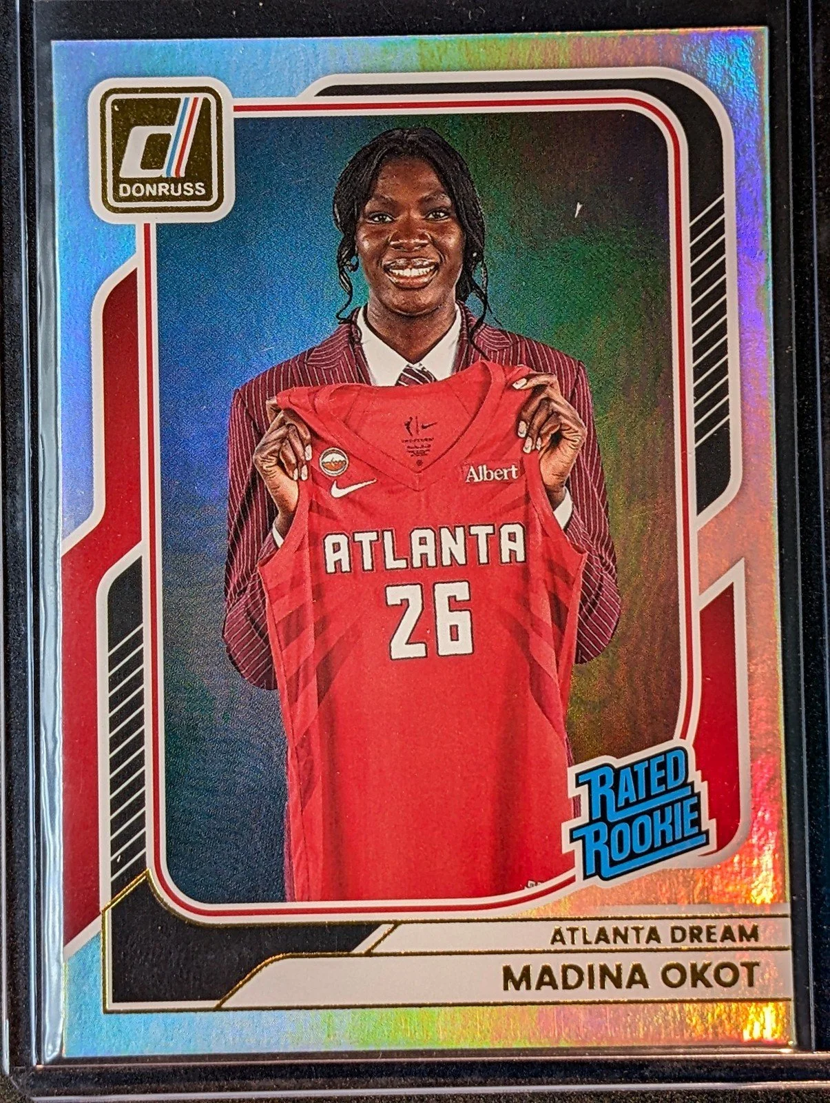 Front of 2026 Panini Donruss WNBA #97 Madina Okot Rated Rookies Holo