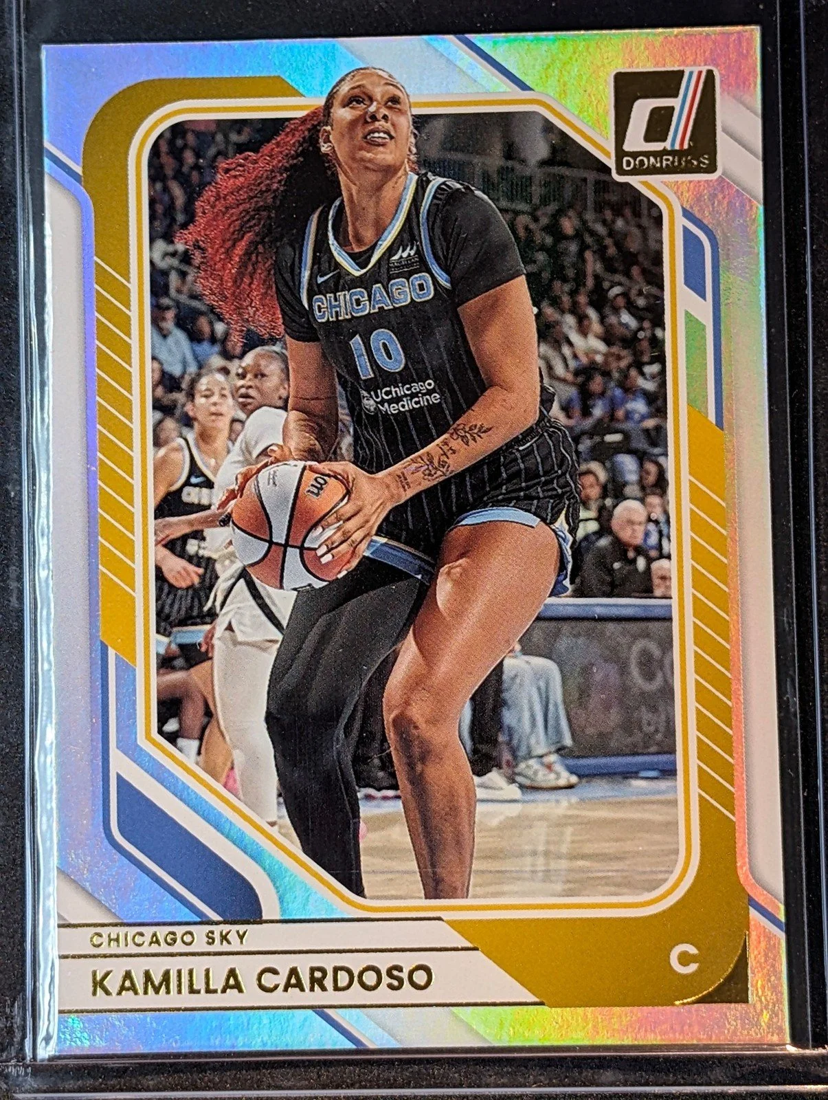 Front of 2026 Panini Donruss WNBA #74 Kamilla Cardoso Holo
