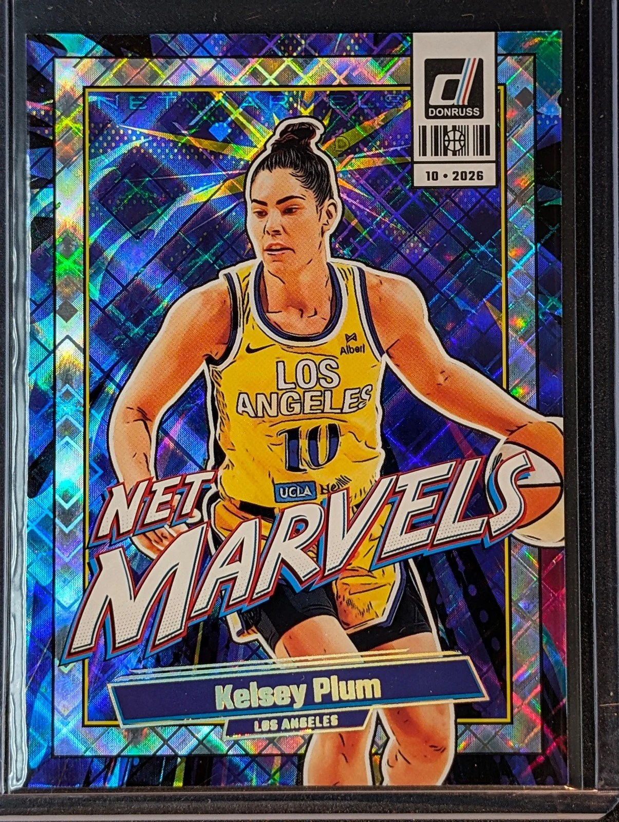 Front of 2026 Panini Donruss WNBA #15 Kelsey Plum Net Marvels Diamond