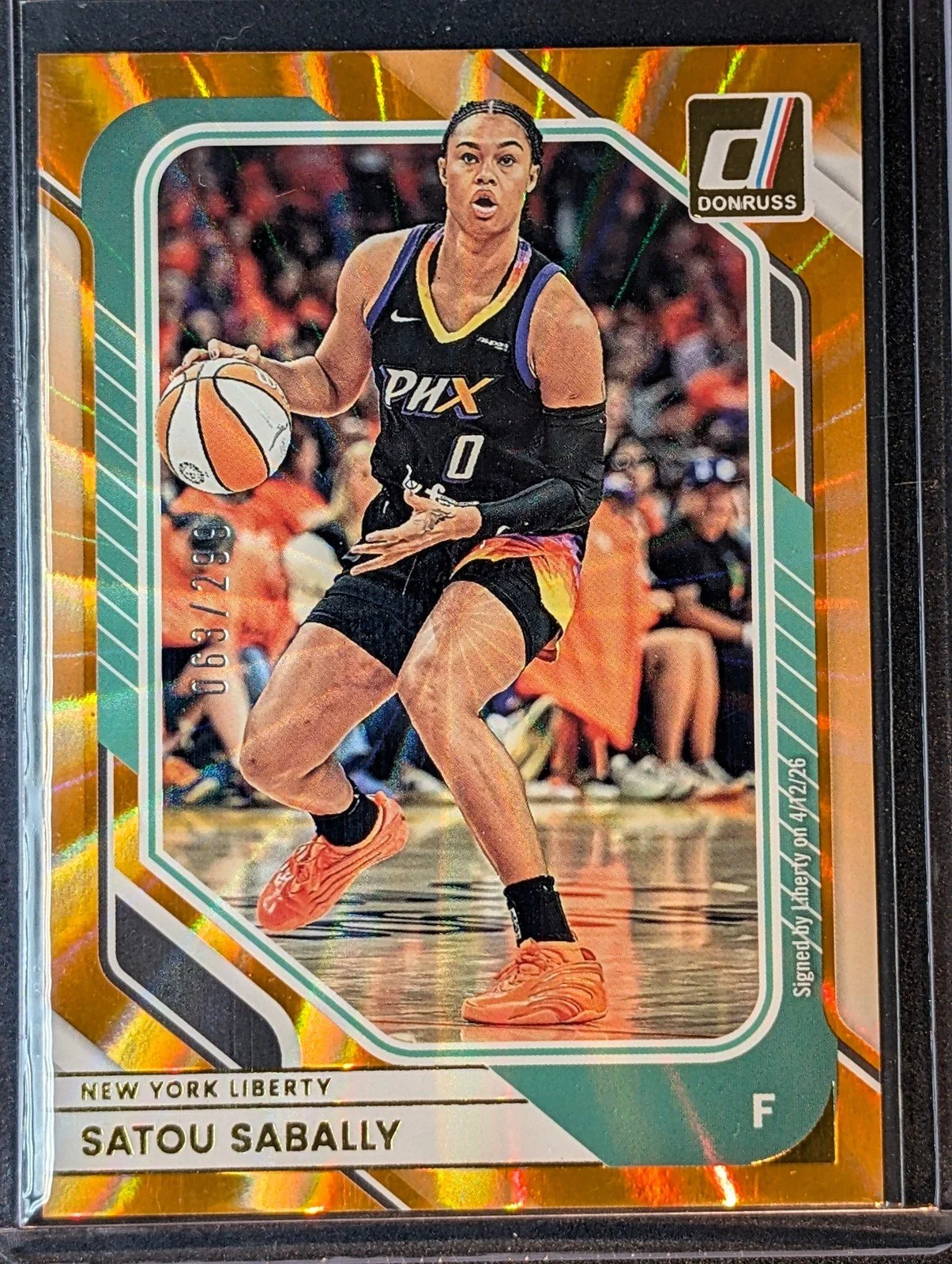 Front of 2026 Panini Donruss WNBA #30 Satou Sabally Orange Laser /299