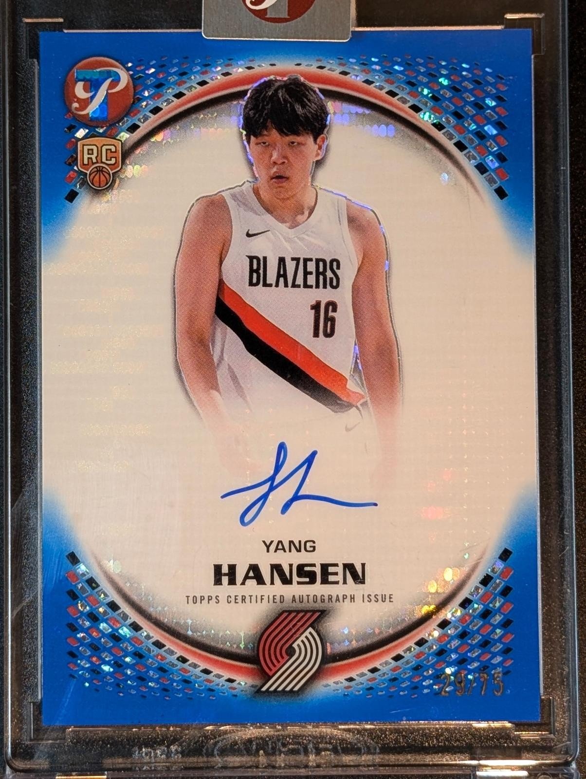 Front of 2025-26 Topps Pristine /75 Yang Hansen Rookie Auto Blue PR-YH RC
