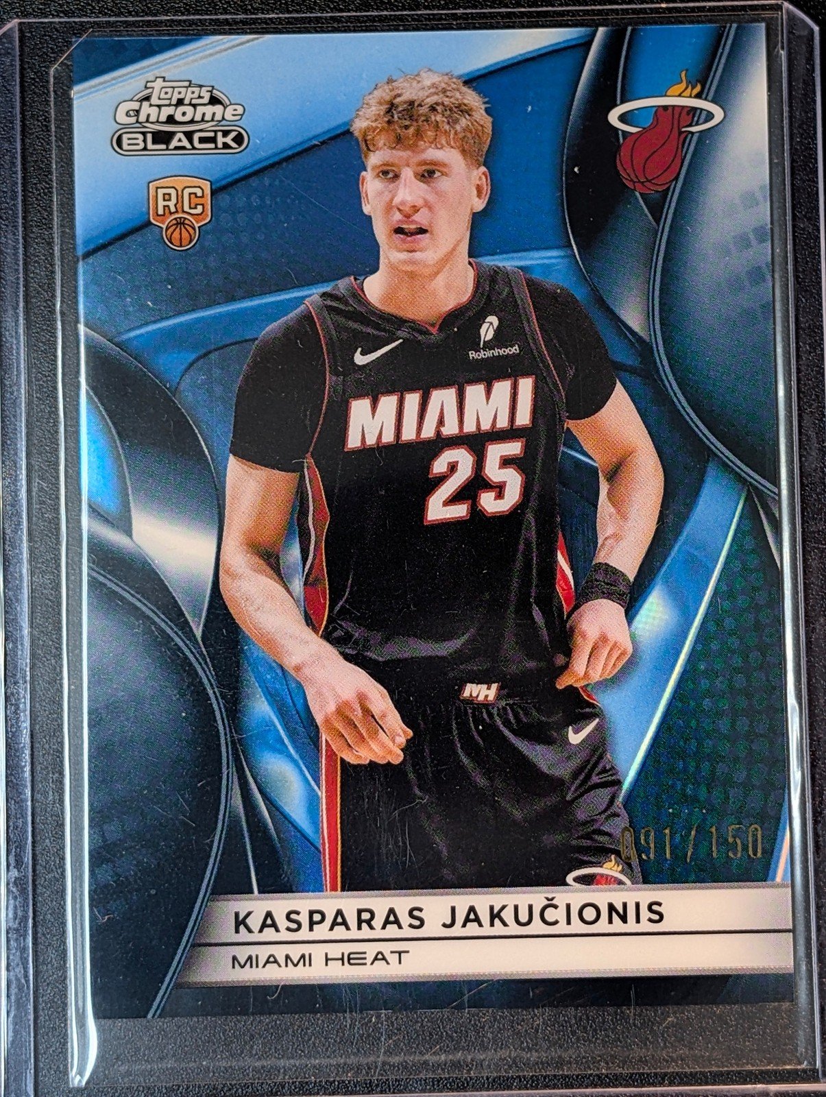 Front of 2025-26 Topps Chrome Black /150 Kasparas Jakučionis Blue Refractor #120 RC