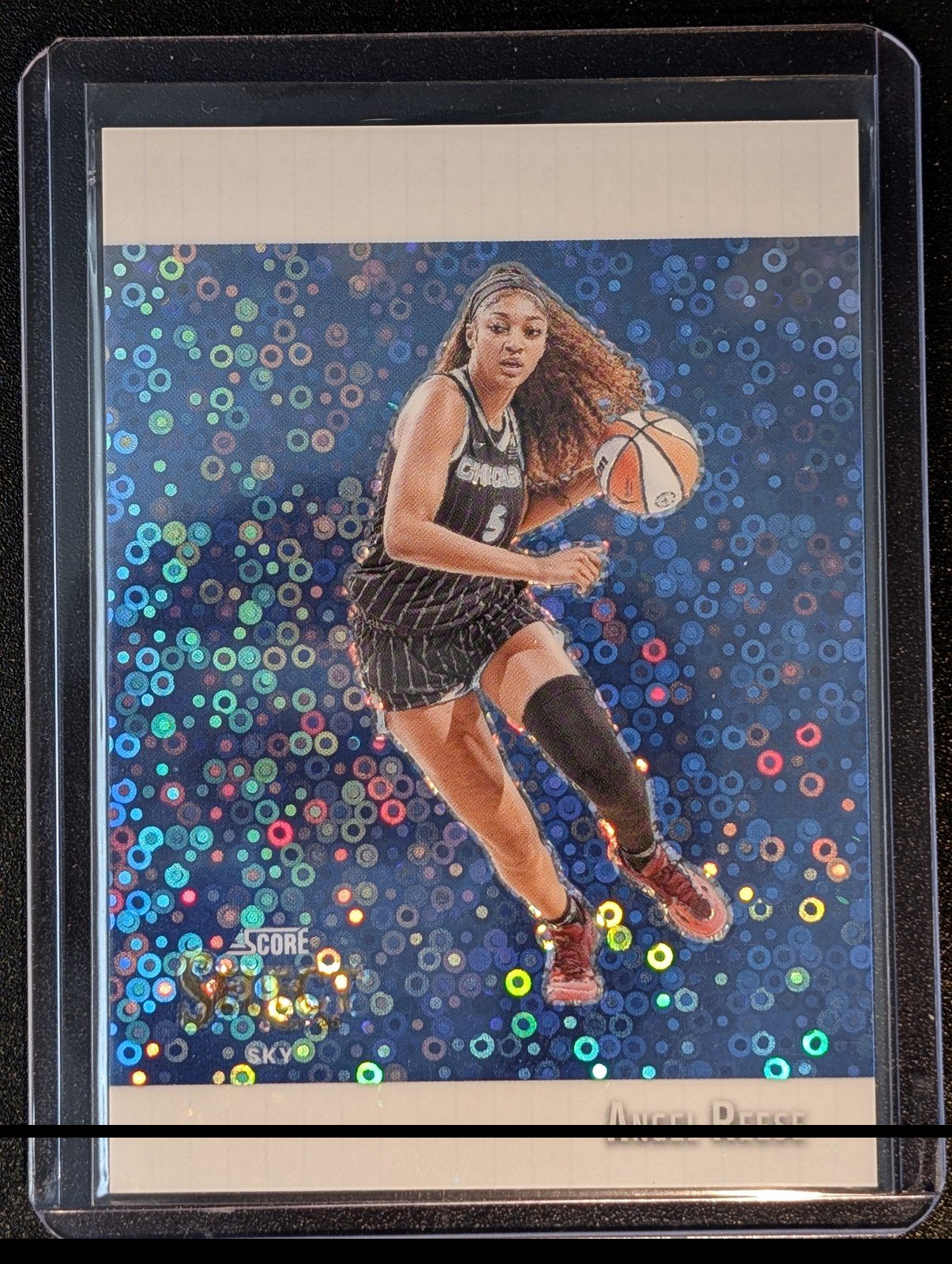 Front of 2025 Panini Select #6 Angel Reese Score Select Throwback Prizms White Disco /75