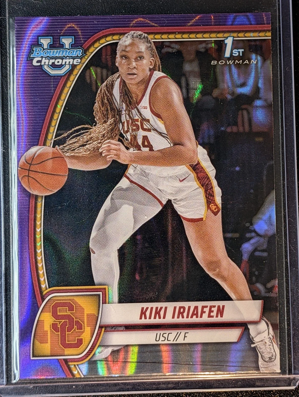 Front of 2024-25 Bowman University Chrome #47 Kiki Iriafen Purple Lava Refractor