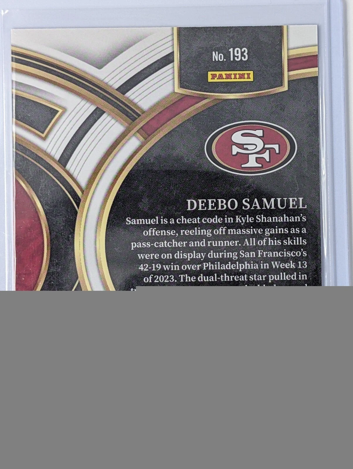 Back of 2023 Panini Select #193 Deebo Samuel Blue Disco Prizms /25