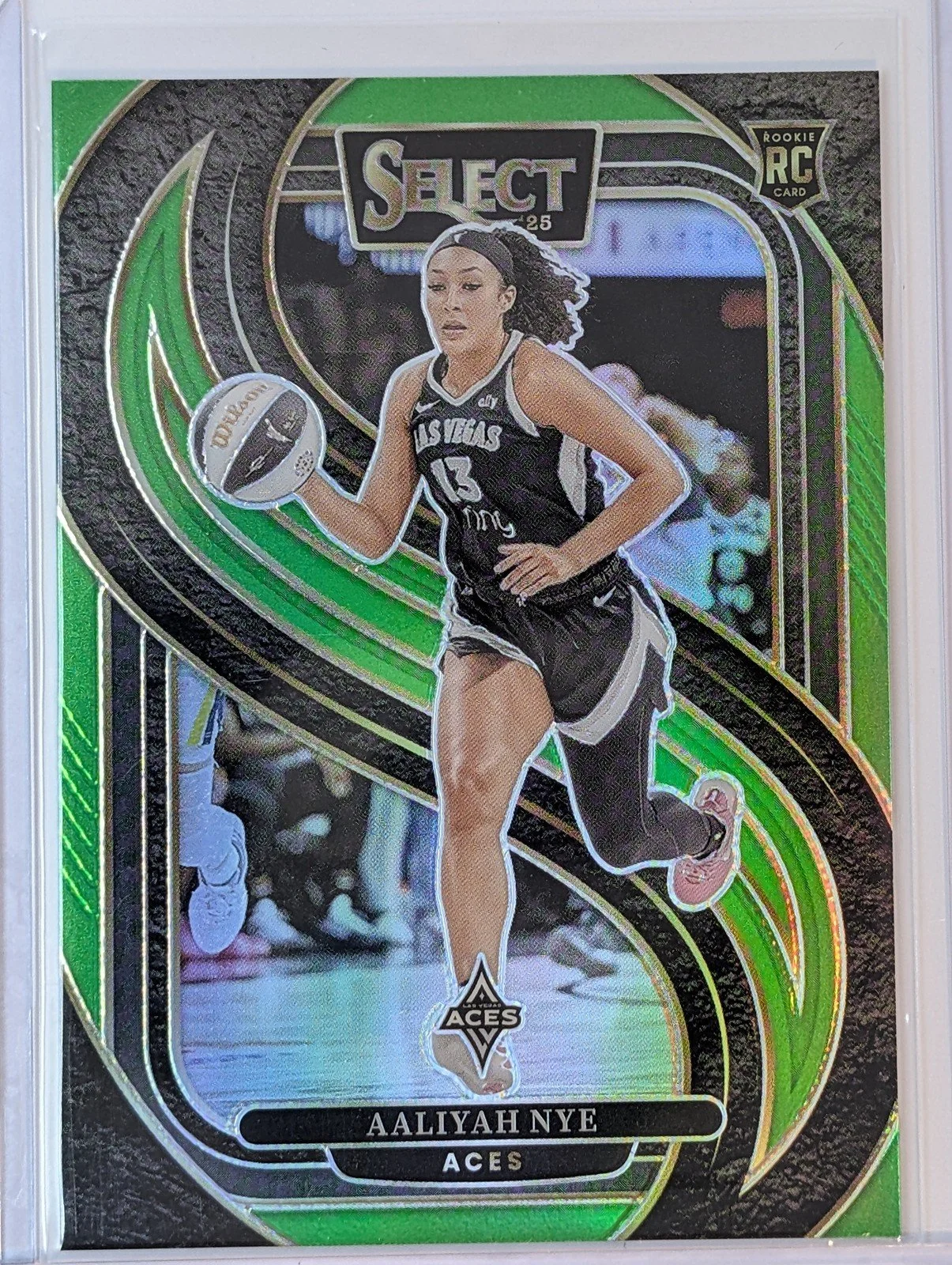 Front of 2025 Panini Select WNBA #123 Aaliyah Nye Green Prizm /75 RC