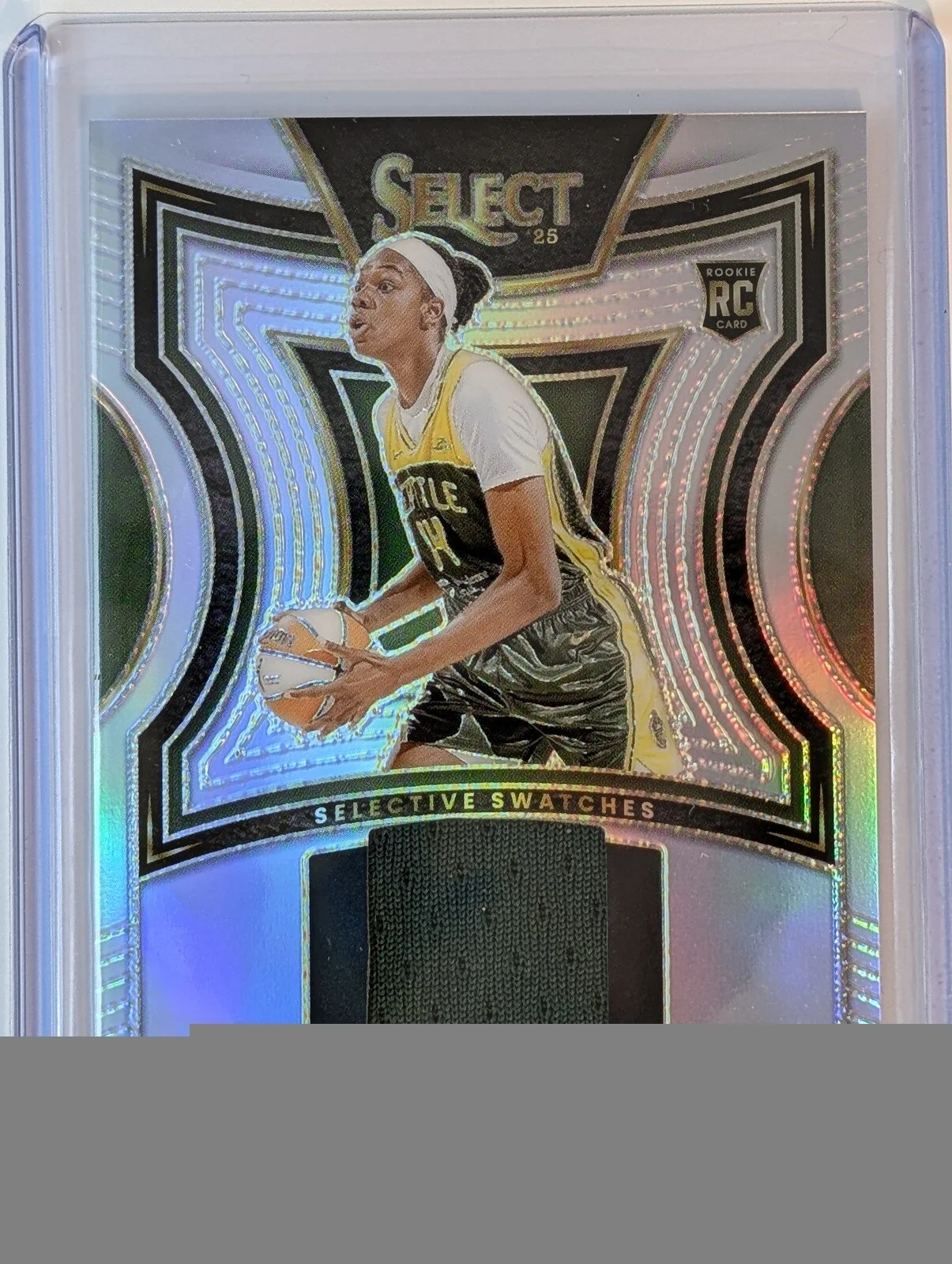 Front of 2025 Panini Select WNBA #SW-DM Dominique Malonga Selective swatches