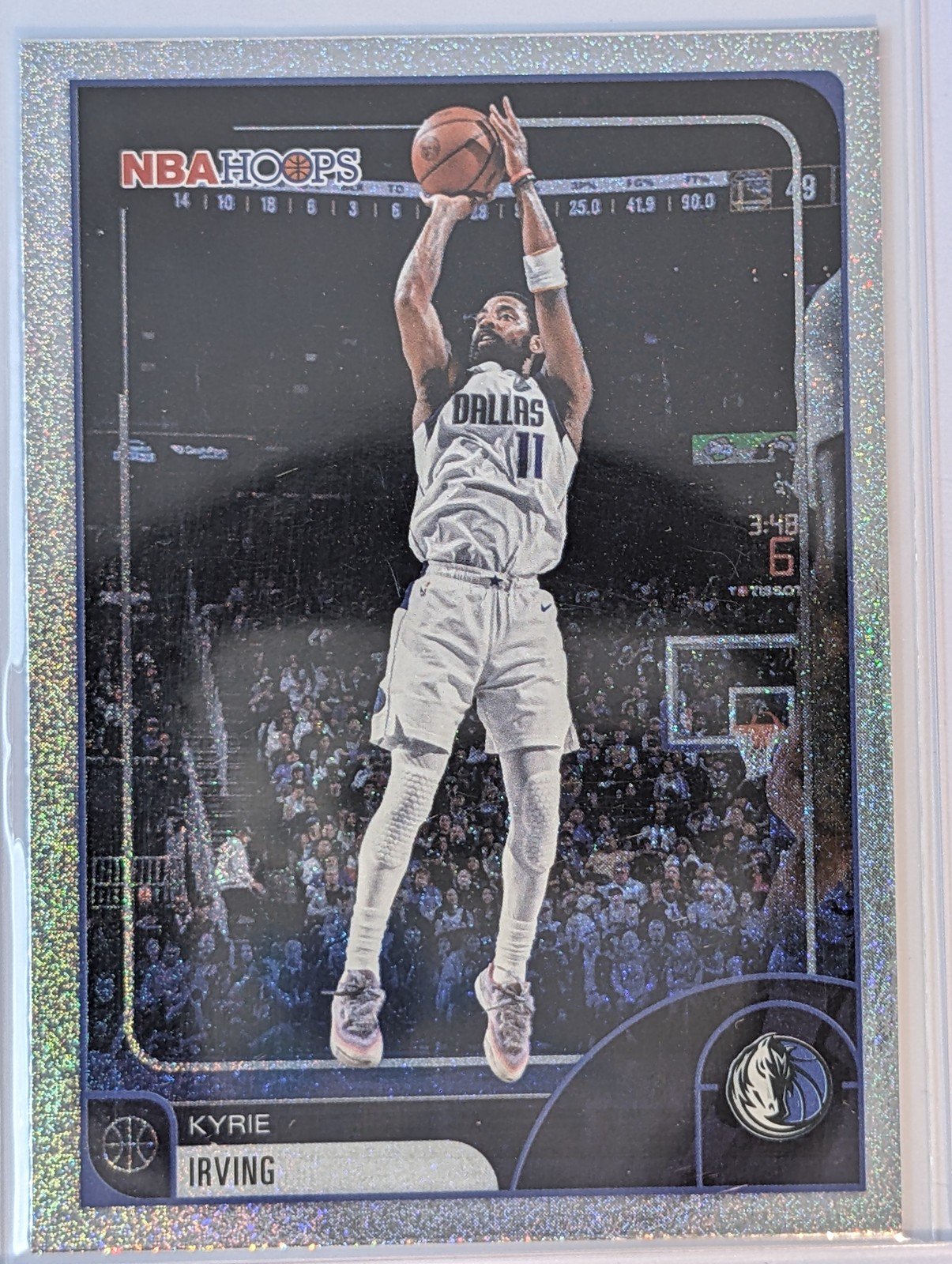 Front of 2025-26 Hoops #25 Kyrie Irving Pixel Burst