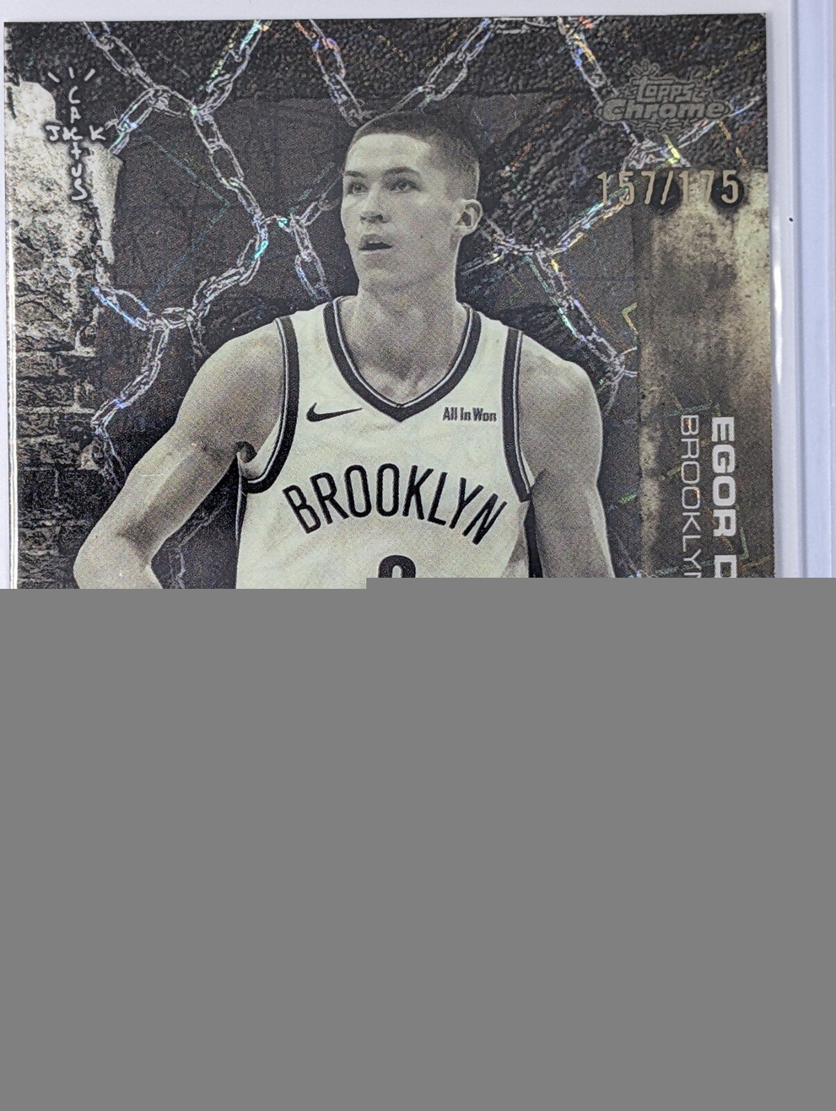Front of 2025-26 Topps Chrome Cactus Jack #68 Egor Dëmin Lasers Refractor #/175