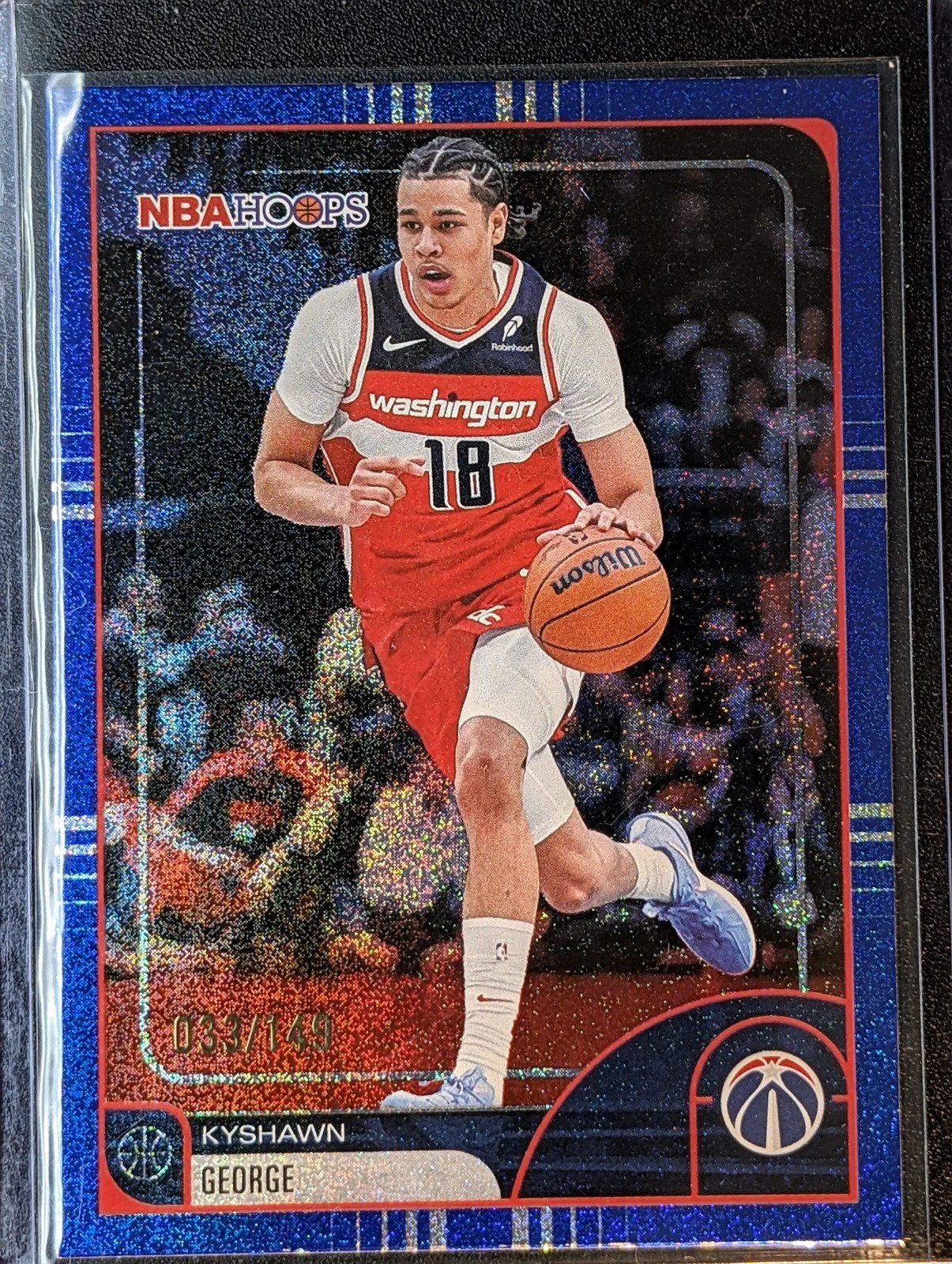 Front of 2025-26 Hoops #56 Kyshawn George Blue Pixel Burst /149