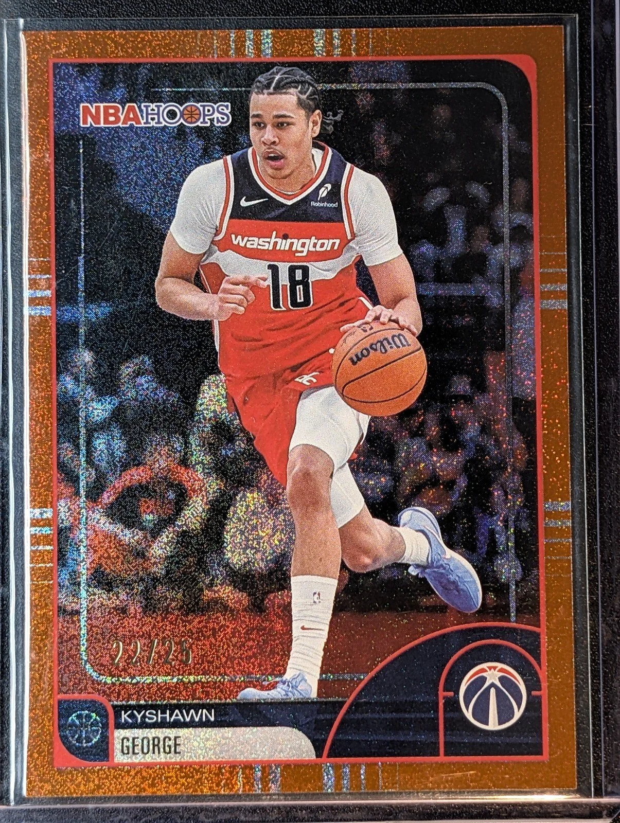 Front of 2025-26 Hoops #56 Kyshawn George Pixel Burst Orange /25
