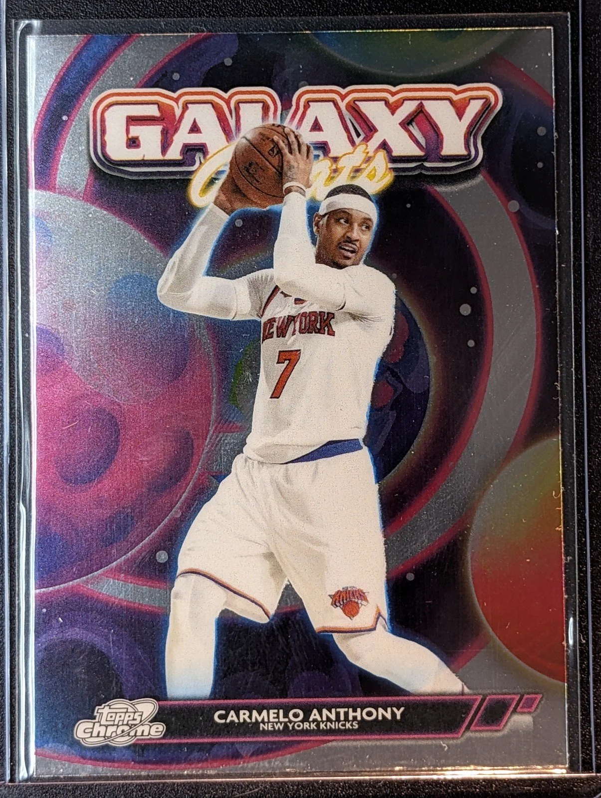 Front of 2025-26 Topps Chrome Cosmic #GG-11 Carmelo Anthony Galaxy Greats