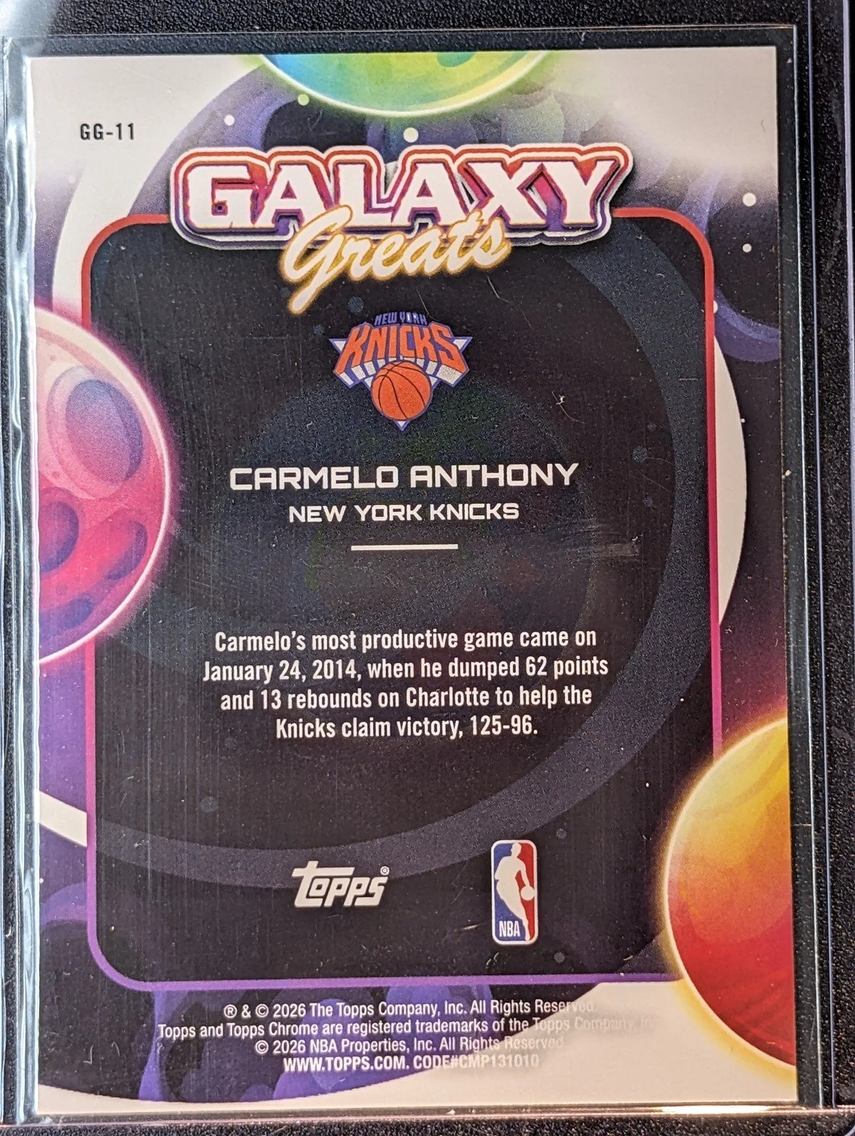 Back of 2025-26 Topps Chrome Cosmic #GG-11 Carmelo Anthony Galaxy Greats