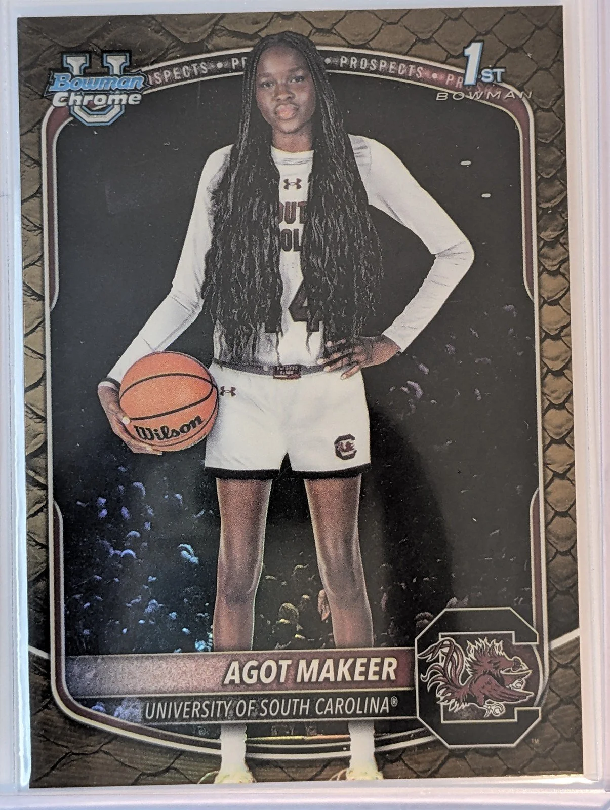 Front of 2025-26 Bowman #BCP-34 Agot Makeer Chrome Prospects Reptilian Refractor