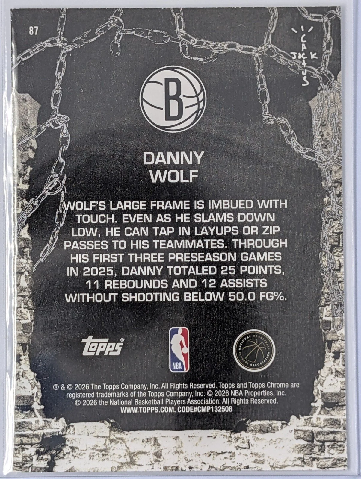 Back of 2025-26 Topps Chrome Cactus Jack #87 Danny Wolf White RC