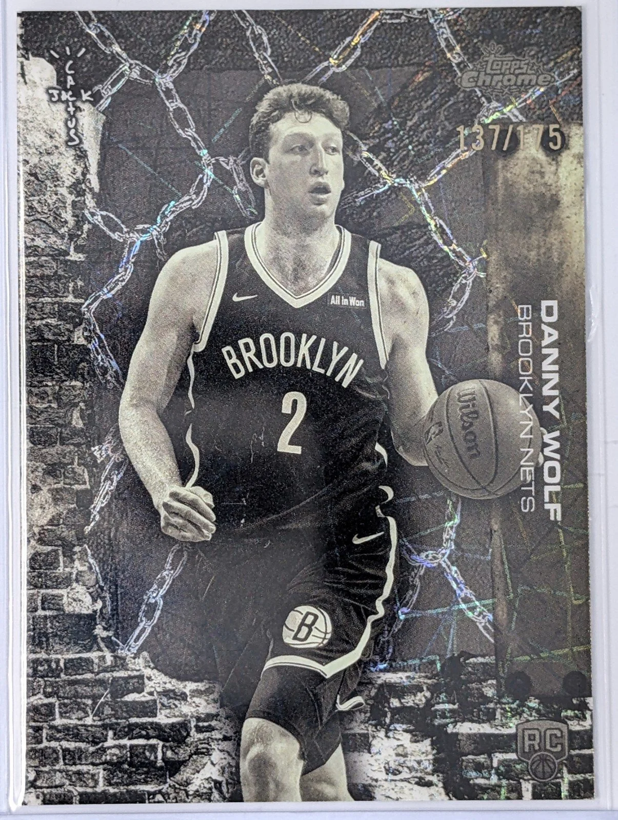 Front of 2025-26 Topps Chrome Cactus Jack #87 Danny Wolf Lasers Refractor #/175