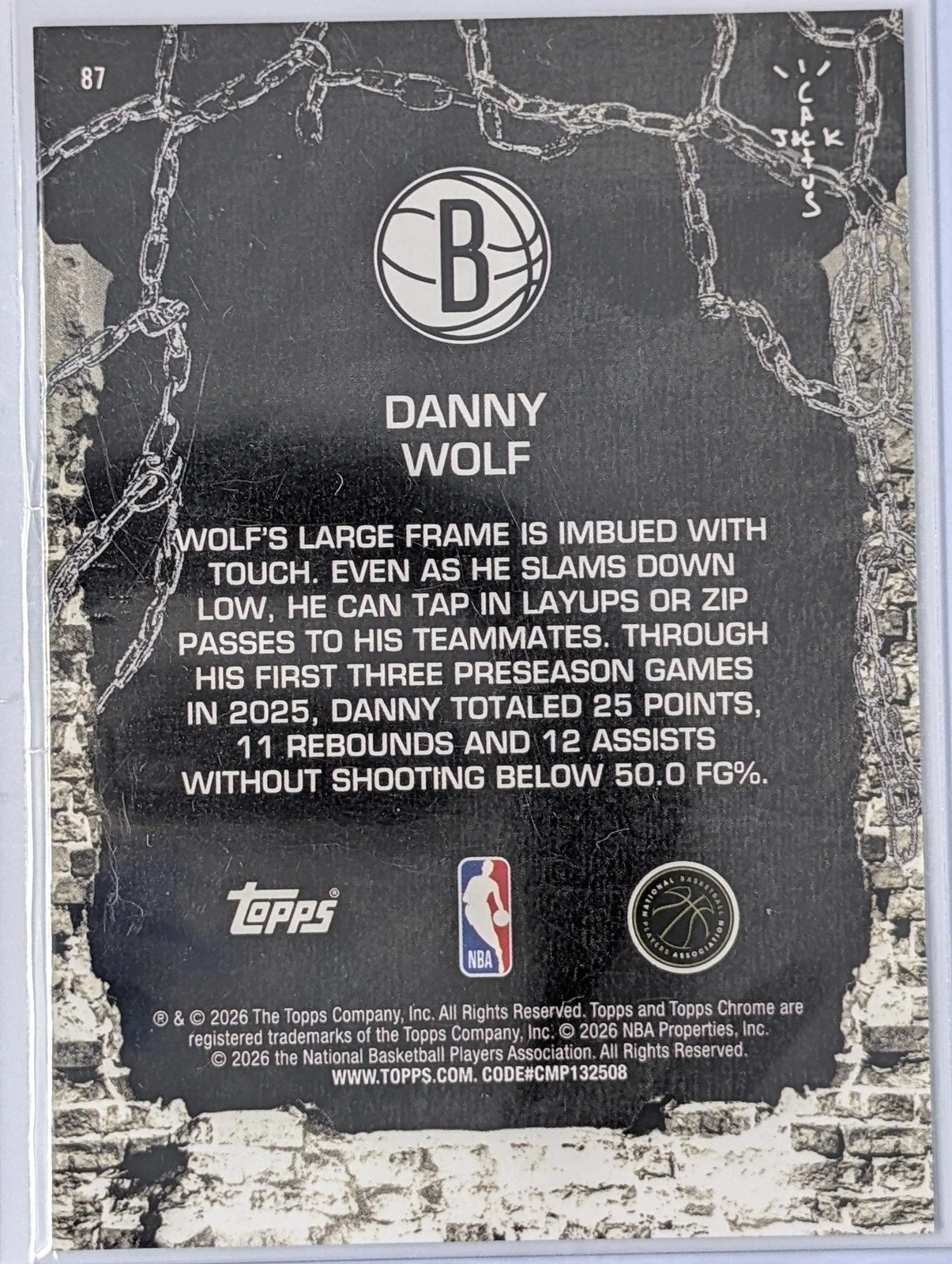 Back of 2025-26 Topps Chrome Cactus Jack #87 Danny Wolf Lasers Refractor #/175