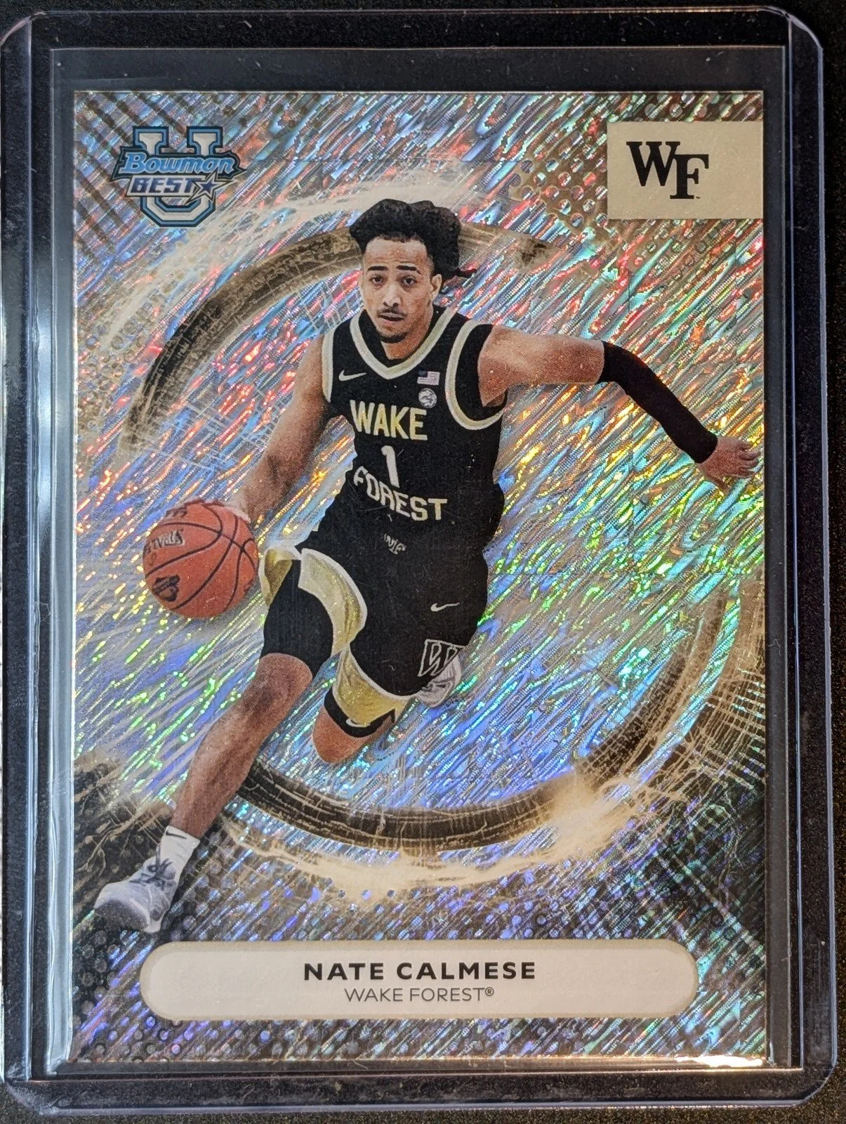 Front of 2025-26 Bowman University U Best Shimmer Refractor SP Nate Calmese #100