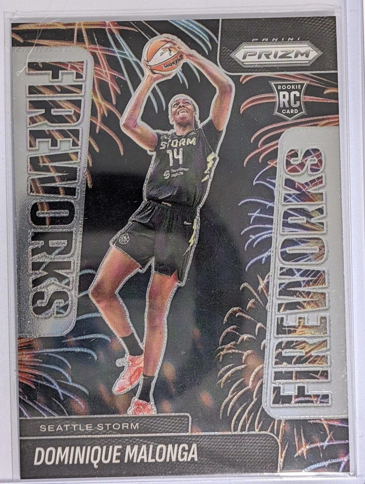 Front of 2025 Panini Prizm WNBA #12 Dominique Malonga Fireworks