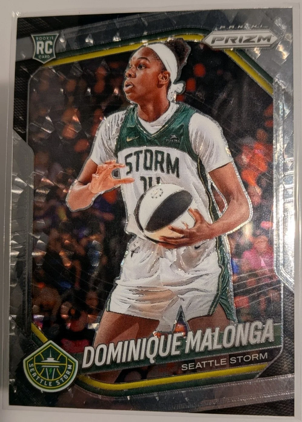 Front of 2025 Panini Prizm WNBA Dominique Malonga #116 RC Swirl Prizm SP