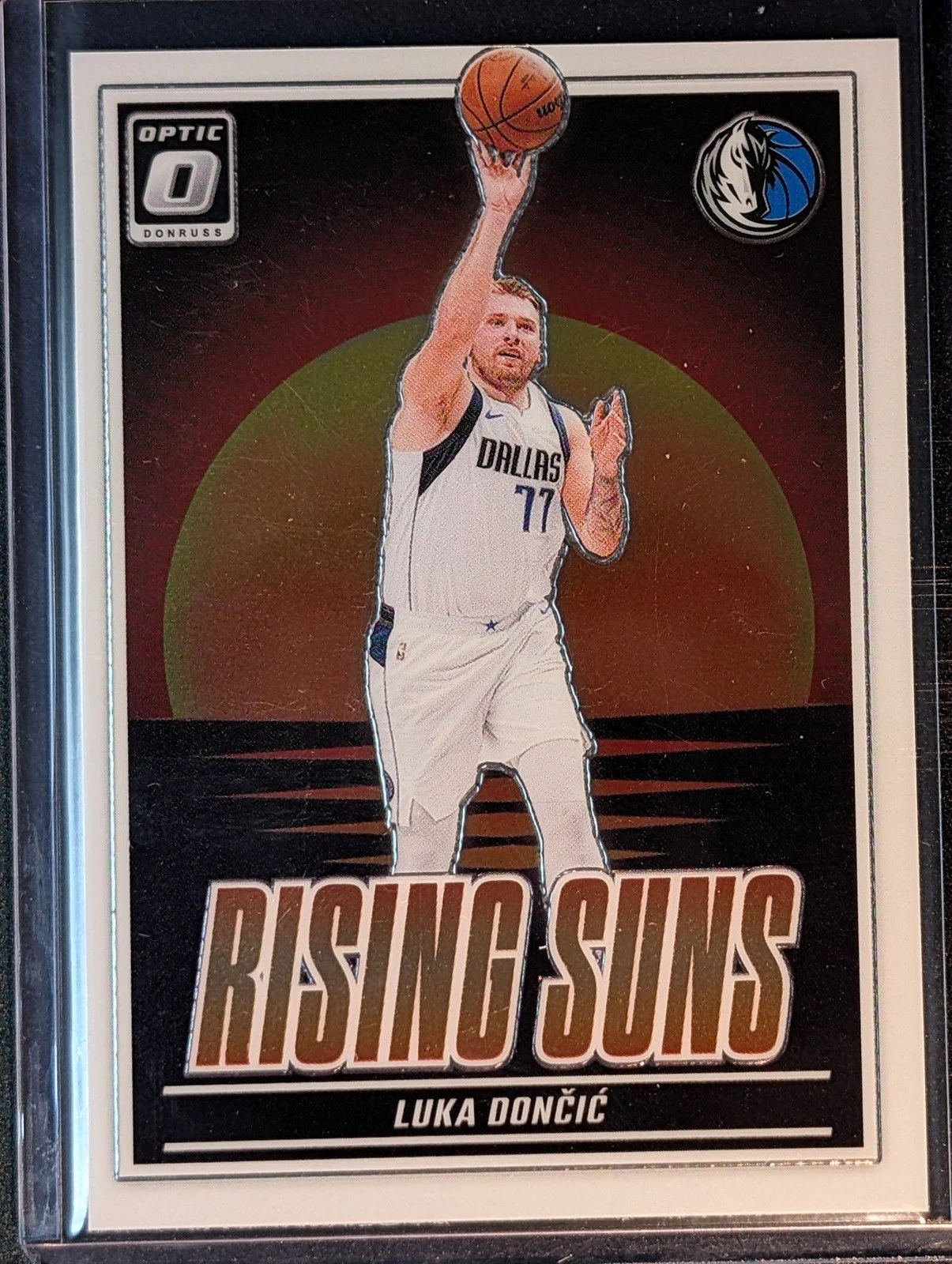 Front of 2024-25 Donruss Optic #4 Luka Doncic Rising Suns