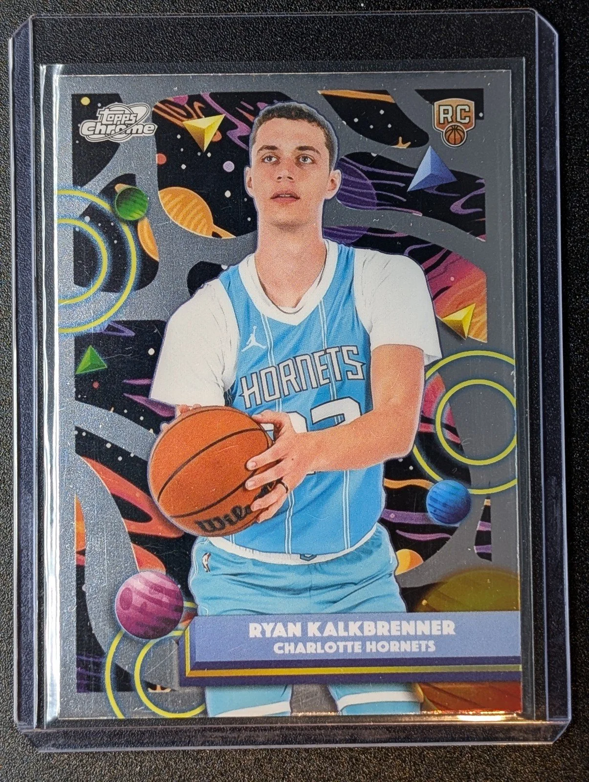 Front of 2025-26 Topps Chrome Cosmic #13 Ryan Kalkbrenner RC