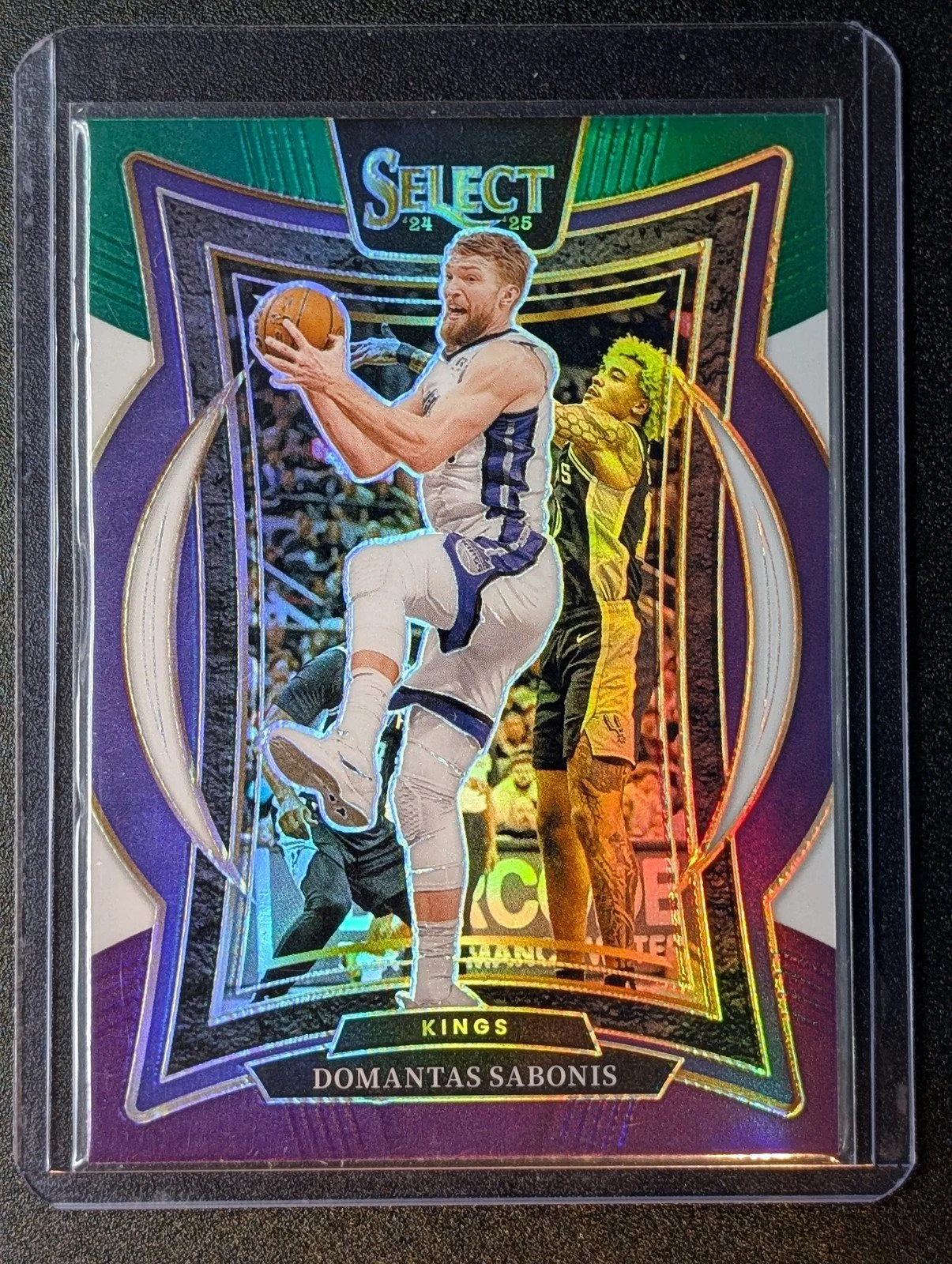 Front of 2024-25 Panini Select #24 Domantas Sabonis Tri-Color Prizm